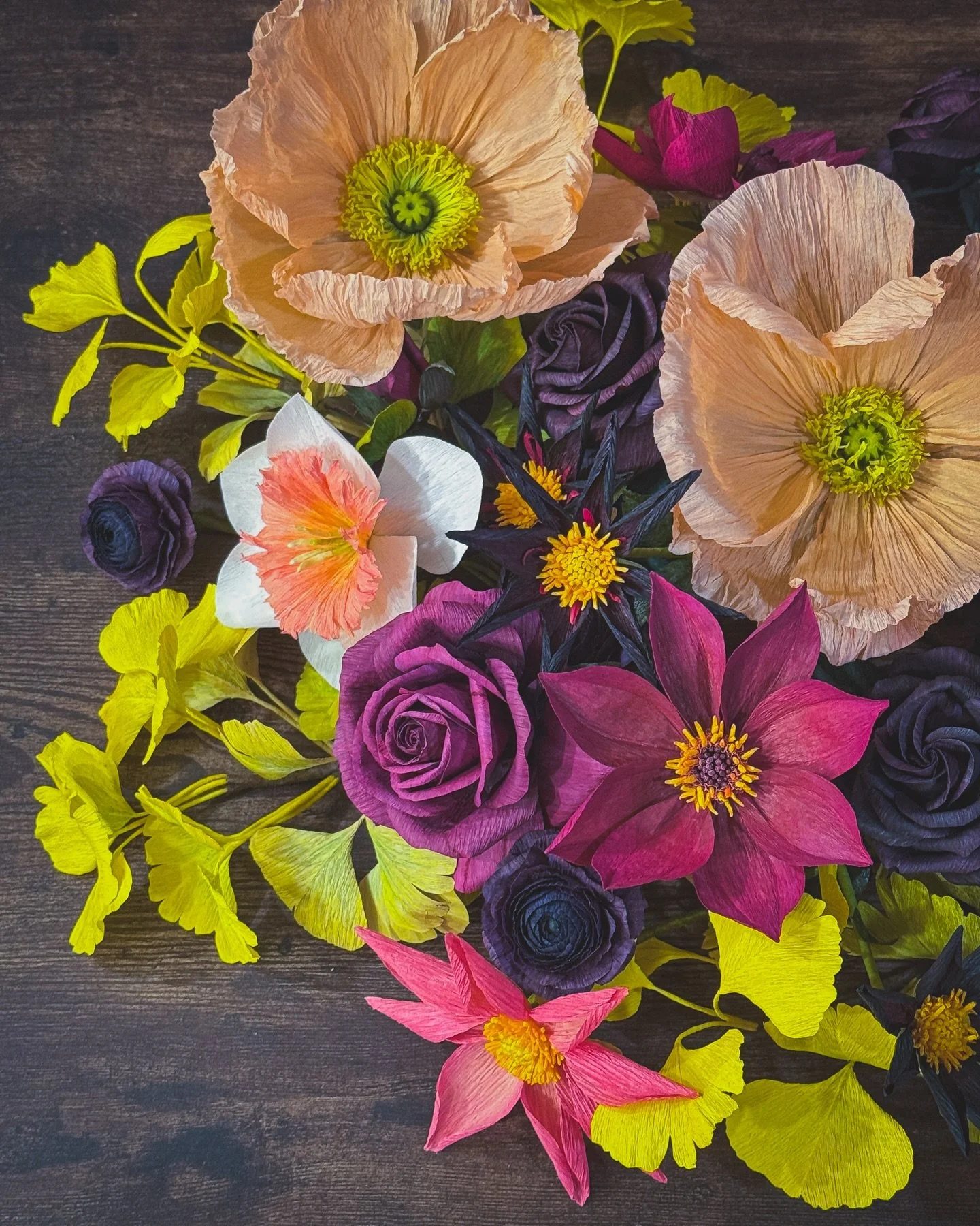 I am obsessed with this color palette of crepe paper flowers and foliage I have made over the last year or so. 

Ginkgo, Icelandic poppies, roses, ranunculus, a daffodil, and some dahlias based on ones I grew in my garden.