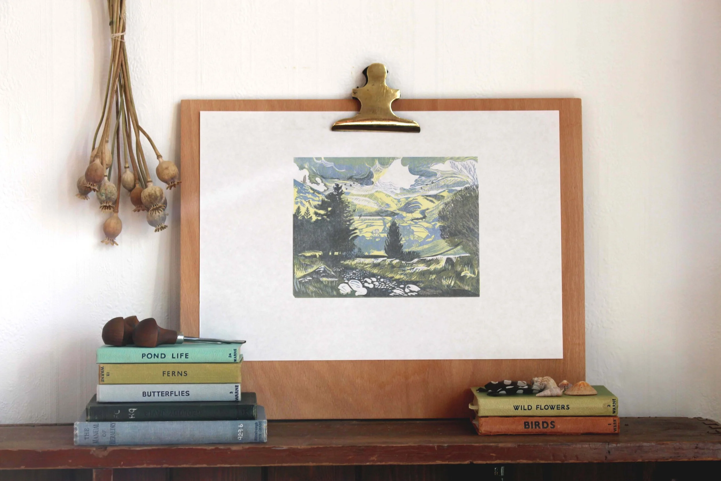 Down the Valley (Blue) limited edition linocut print by Cat Moore multiblock cumbria borrowdale fells woodland footpath yellow blue grey sunshine storm clouds