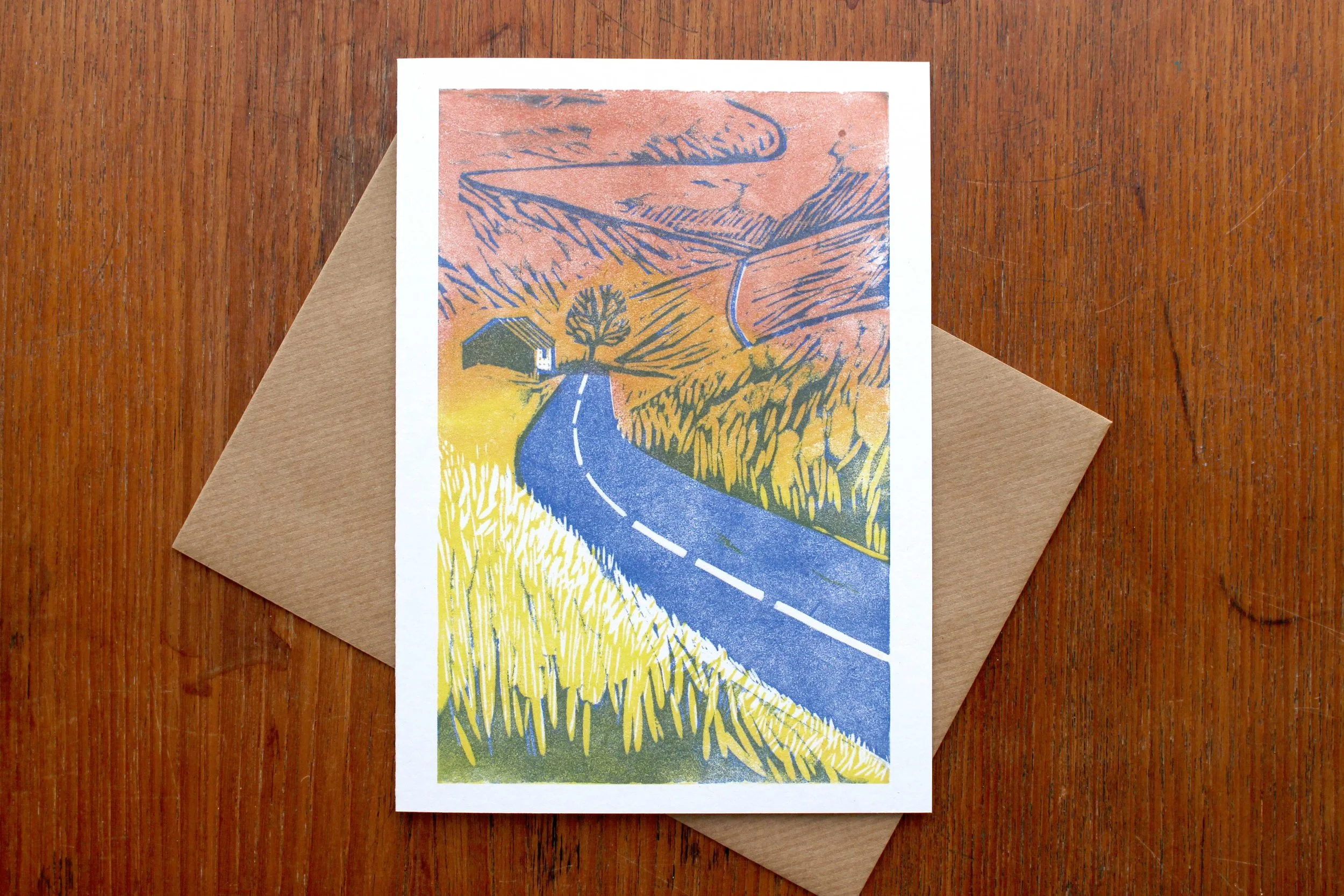 Crossing the Moor linocut greeting card Cat Moore blue road hills northumberland late summer