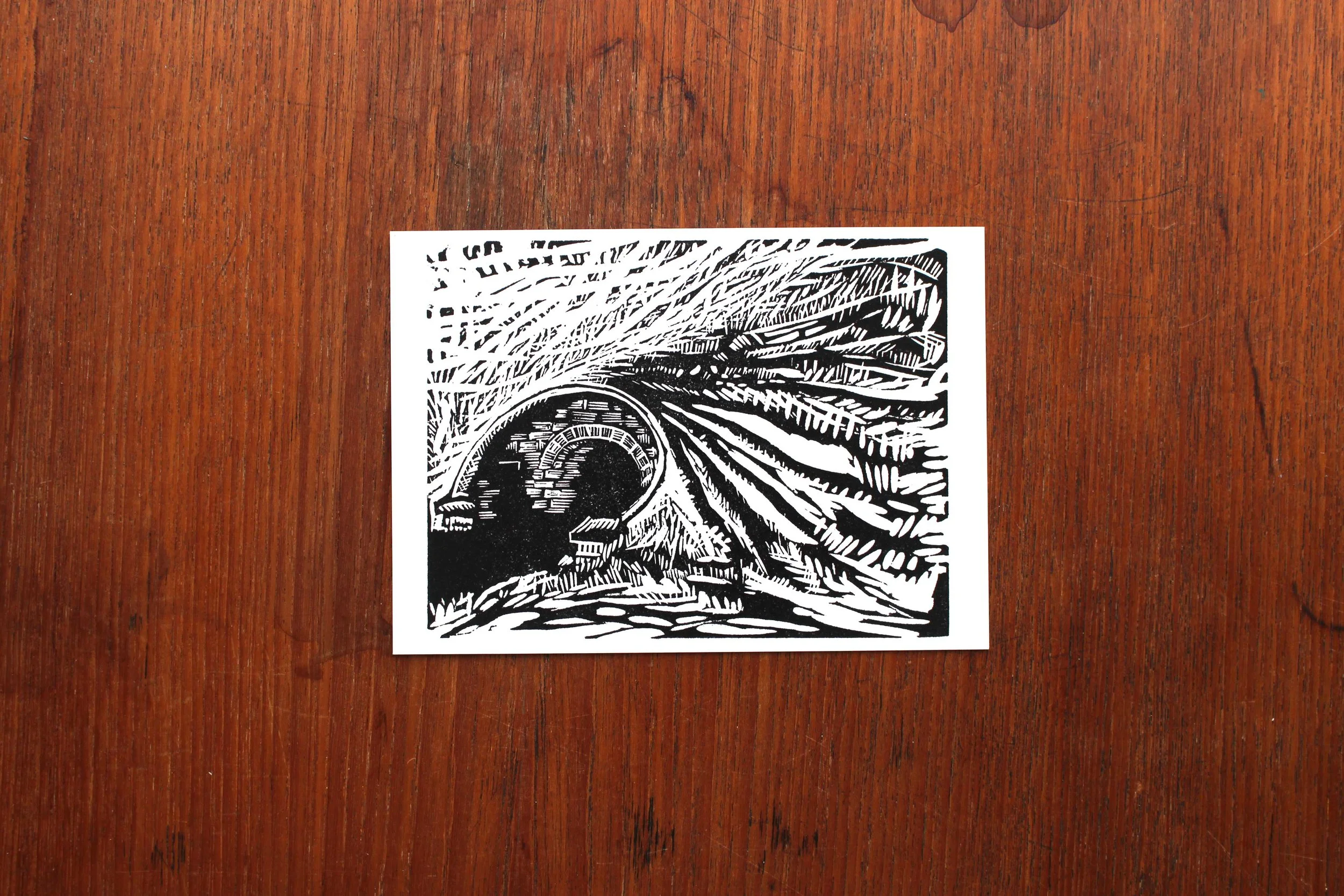 Postcard walk river railway bridge linocut print Cat Moore single block field nature tracks
