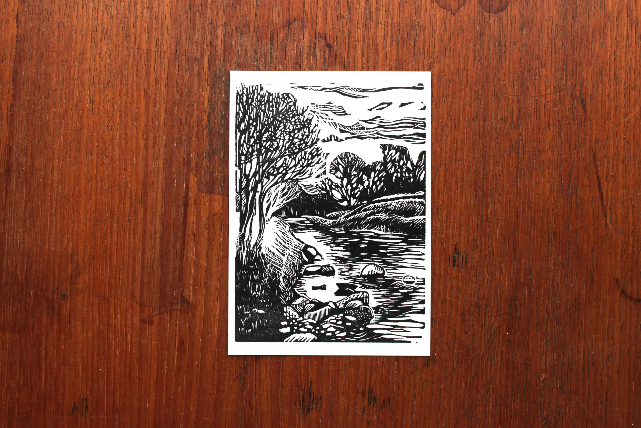 Postcard walk river looking back linocut print Cat Moore tree single block river