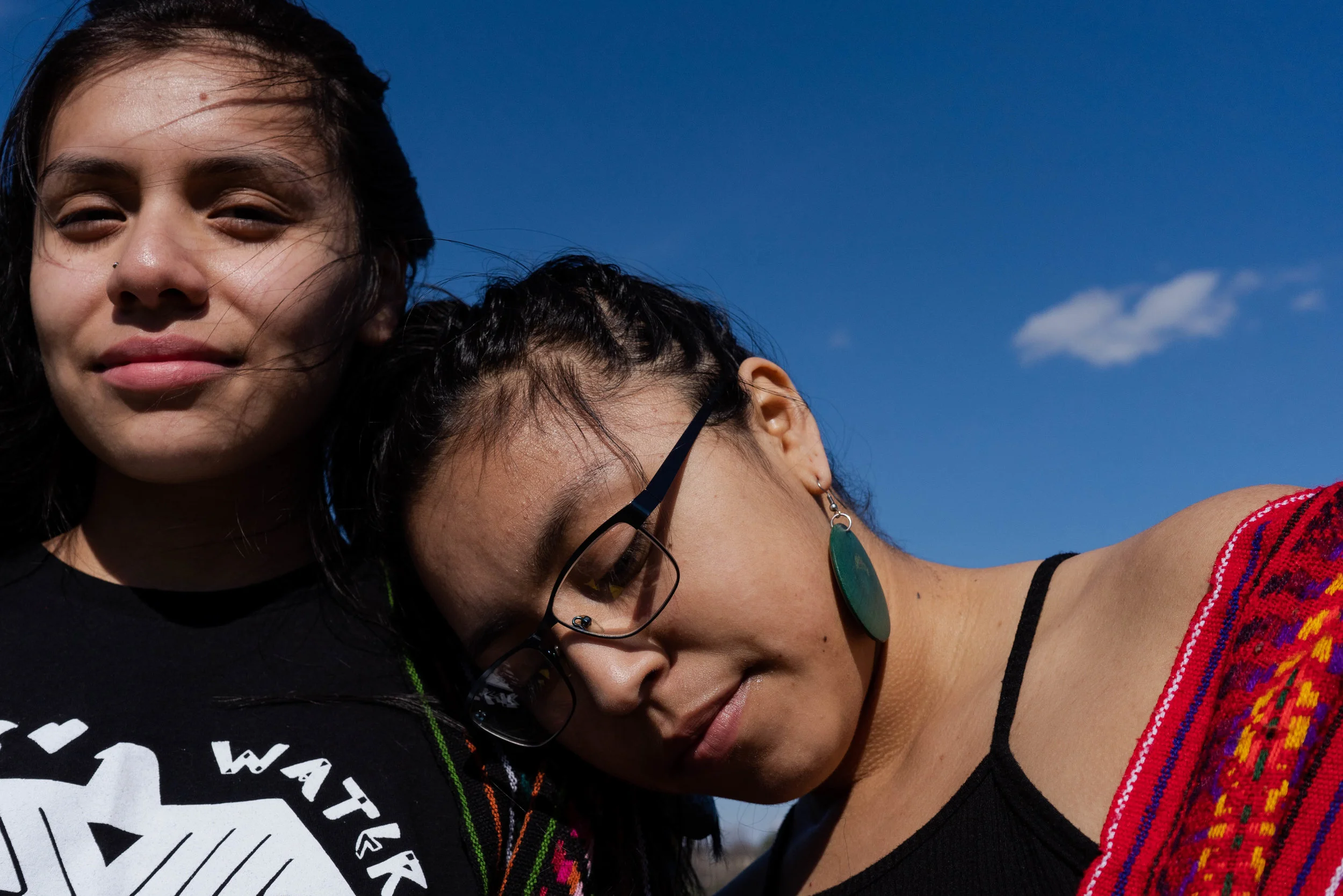 Amoreina Espinosa (left) and Reyna Day (right) stand for a portrait at Lake Phalen. Photo by Iyana Esters | The Water Main
