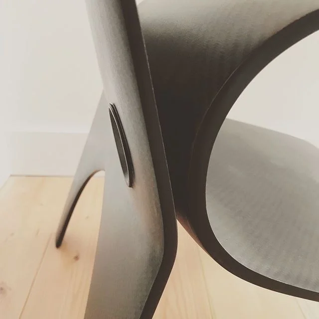 Carbon fiber and walnut chair detail, production version in development