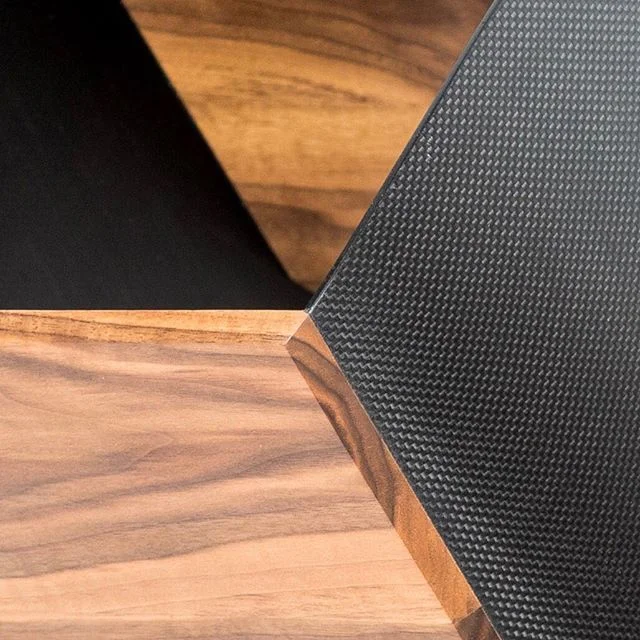 Side table detail: black walnut and carbon fiber. Thin, strong.