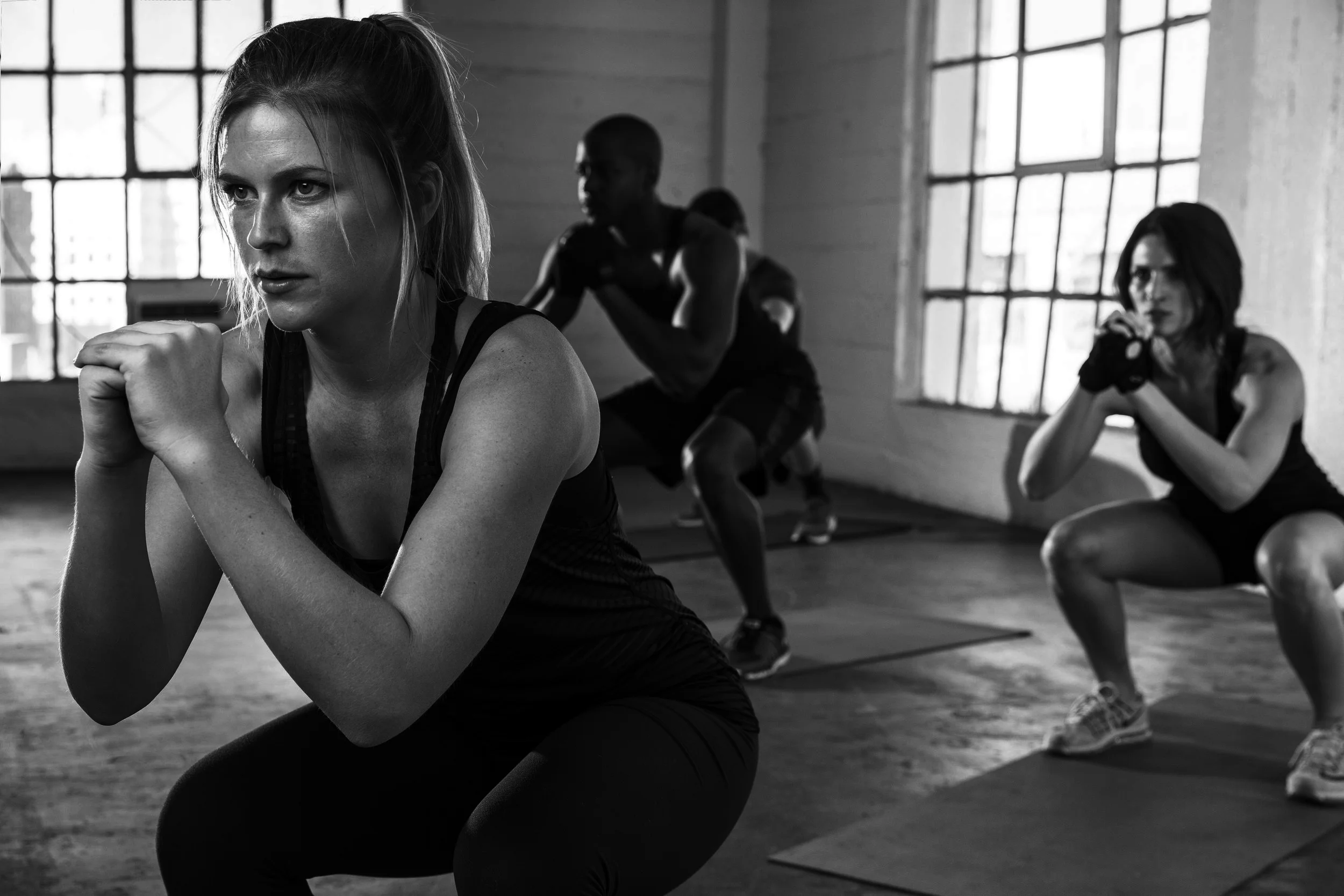People doing squat rounds.