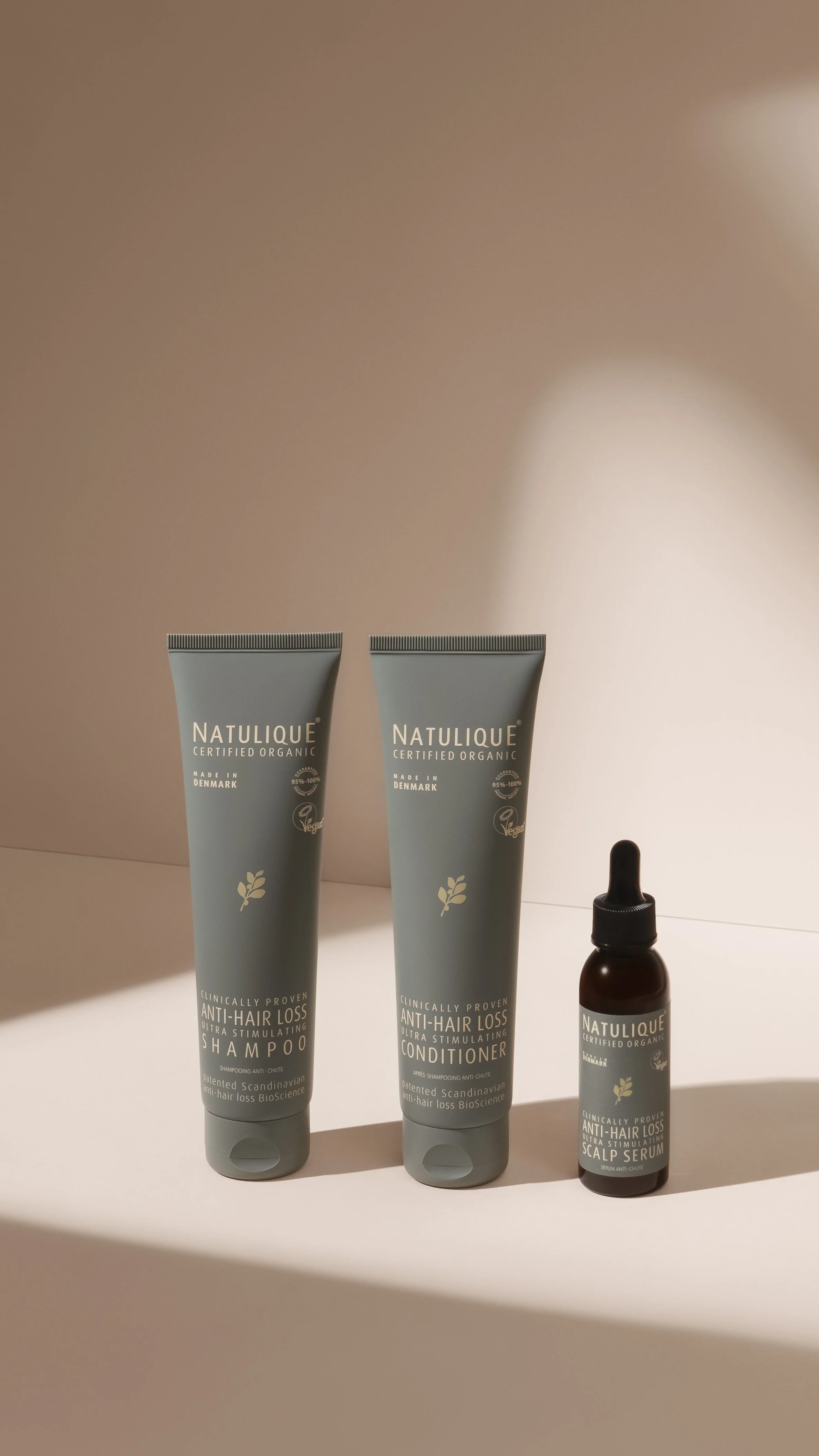 NATULIQUE-ANTI-HAIR-LOSS-SHAMPOO-CONDITIONER-AND-SERUM-IN-SHADOWS-V02-9x16.JPG