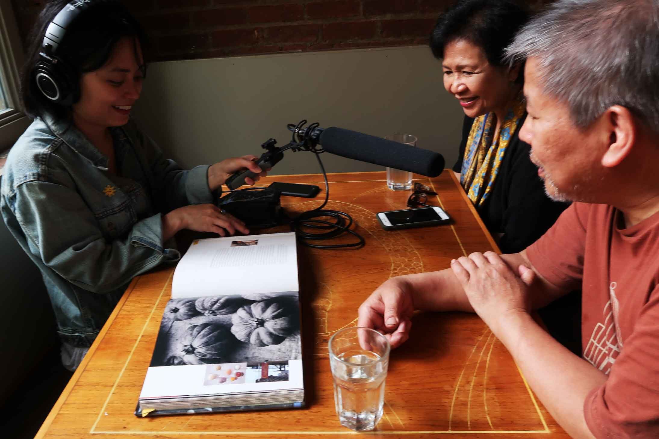  Long Distance host/producer Paola Mardo talks to Amy Besa and Romy Dorotan about their book “Memories of Philippine Kitchens” in Purple Yam Brooklyn. Photo by Patrick Epino. 