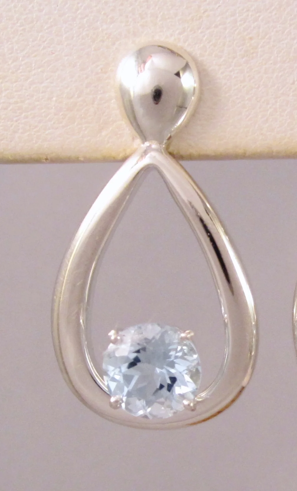 Silver and Topaz Balancing Act Drop Earring