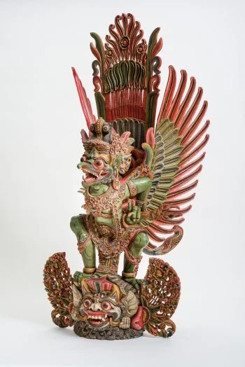 Garuda, the human-bird creature familiar in Buddhist and Hindu traditions but not typically seen in Chinese culture; this carving is from Bali, Indonesia