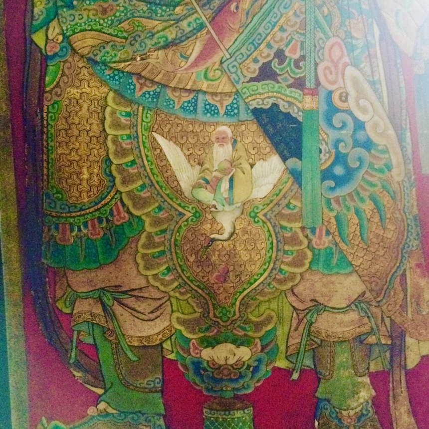 Anping temple Door God wears clothing with crane-riding sage holding a peach of longevity