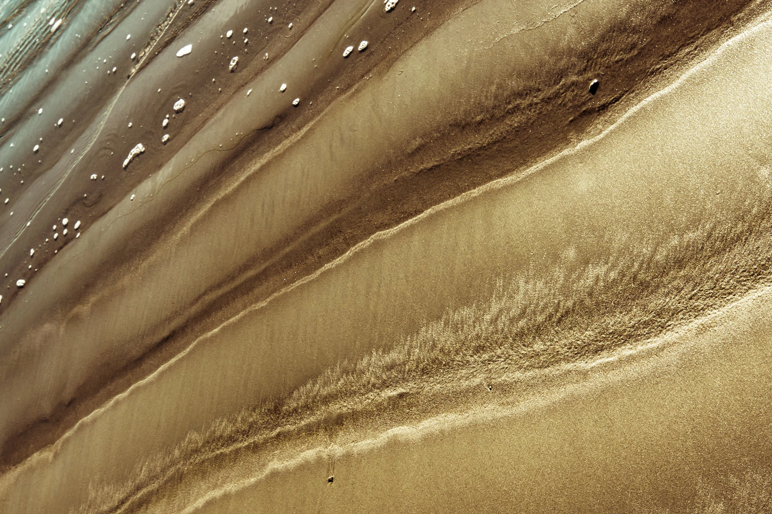 beachsandandwaterIcrop.jpg