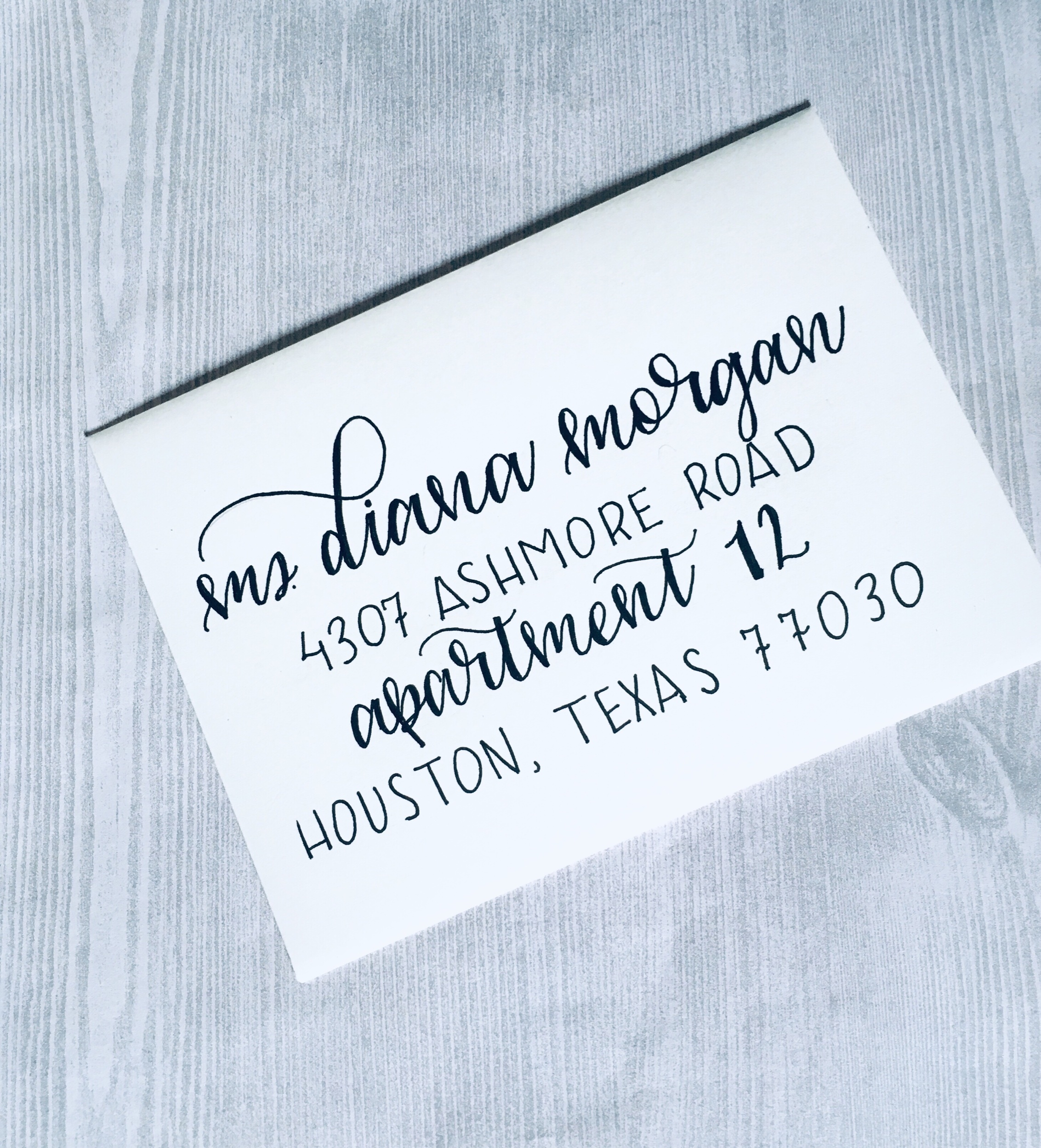 In this envelope I combined both a script font in faux calligraphy and a Sans serif style.