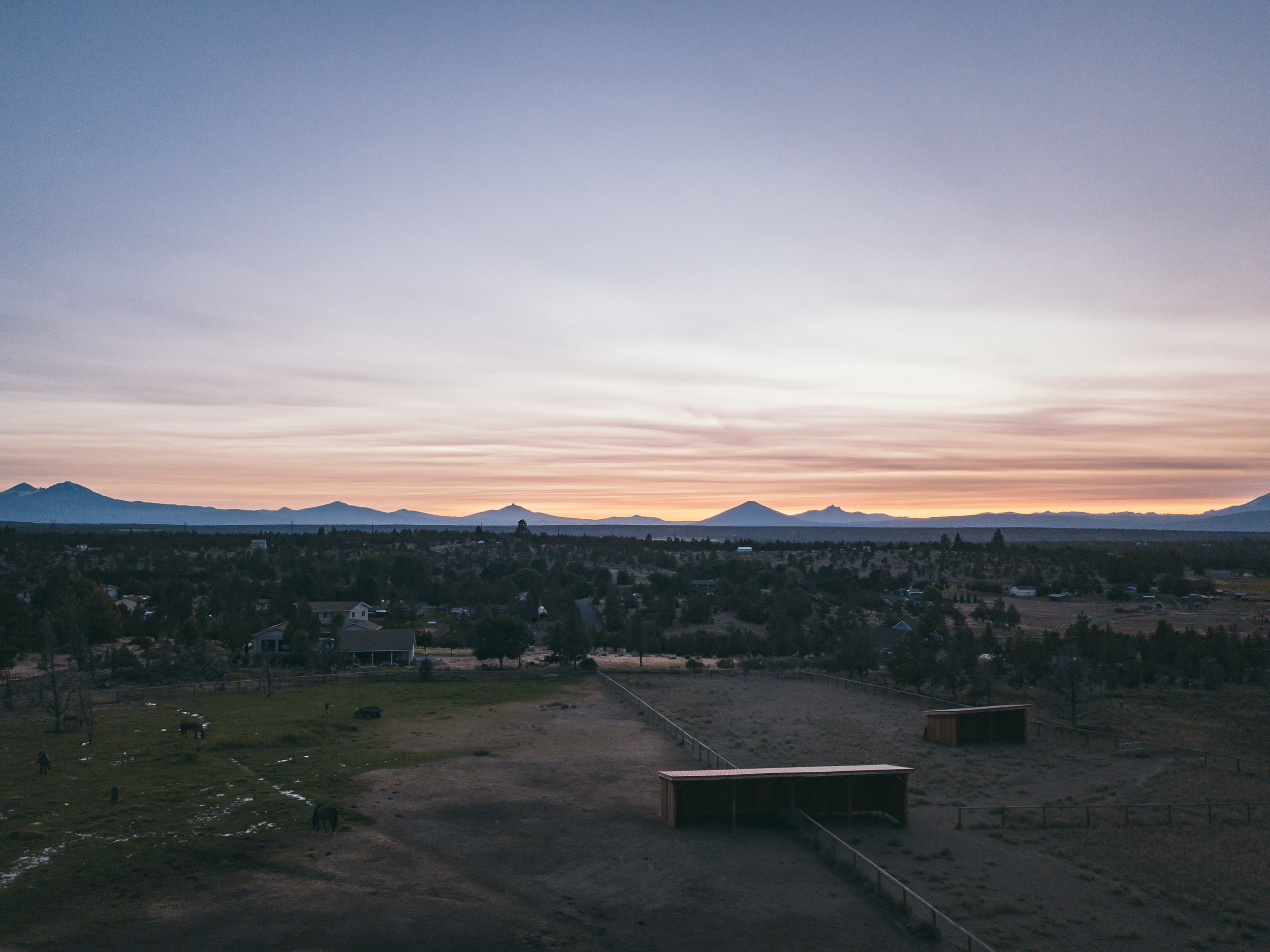 The horses get spoiled with the best sunsets, over the Cascade Mountains.