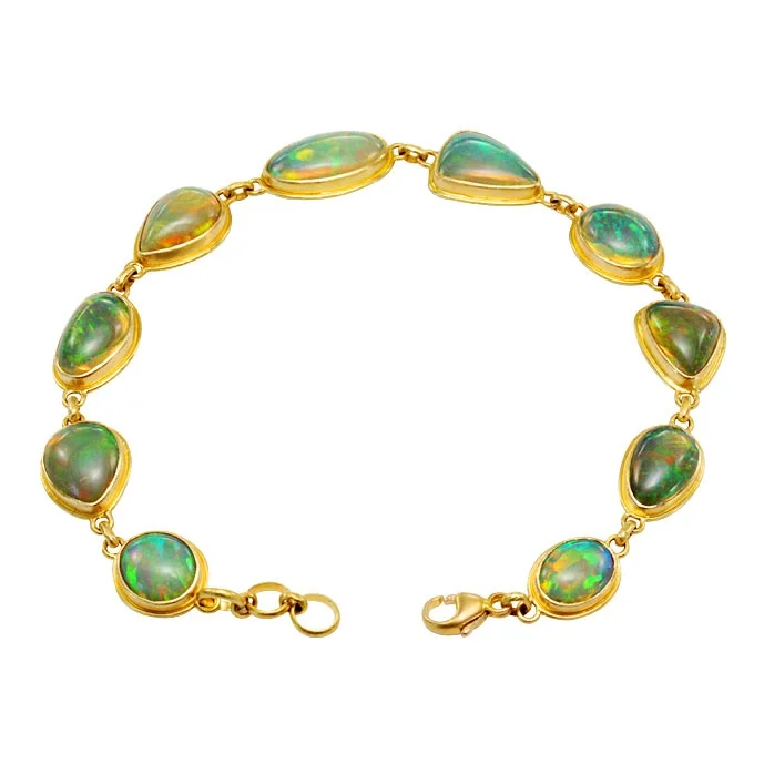 18 Karat yellow gold bracelet featuring 10 opals weighing a total of 10.2 carats. $2,650.00