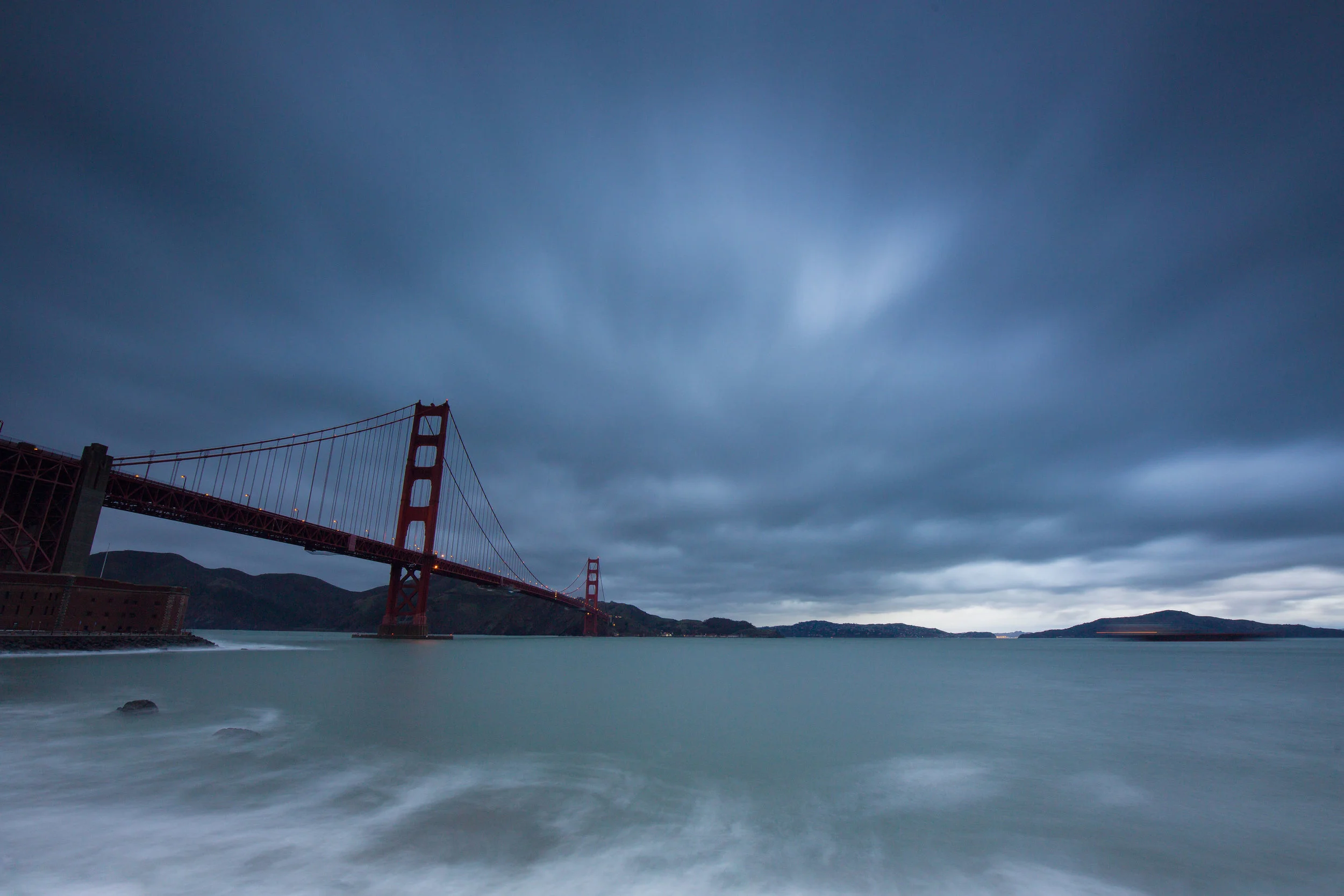 The Golden Gate Bridge under storm cloud