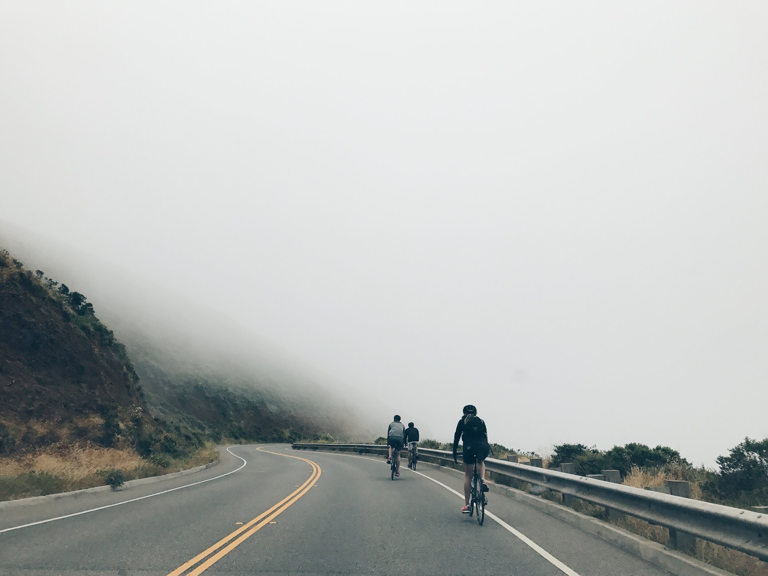 Cyclists on a coastal road