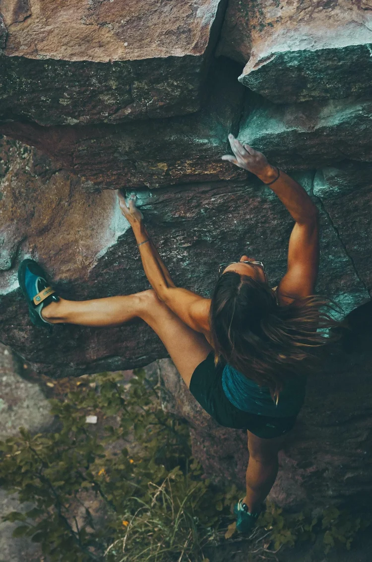 A climber gripping rock