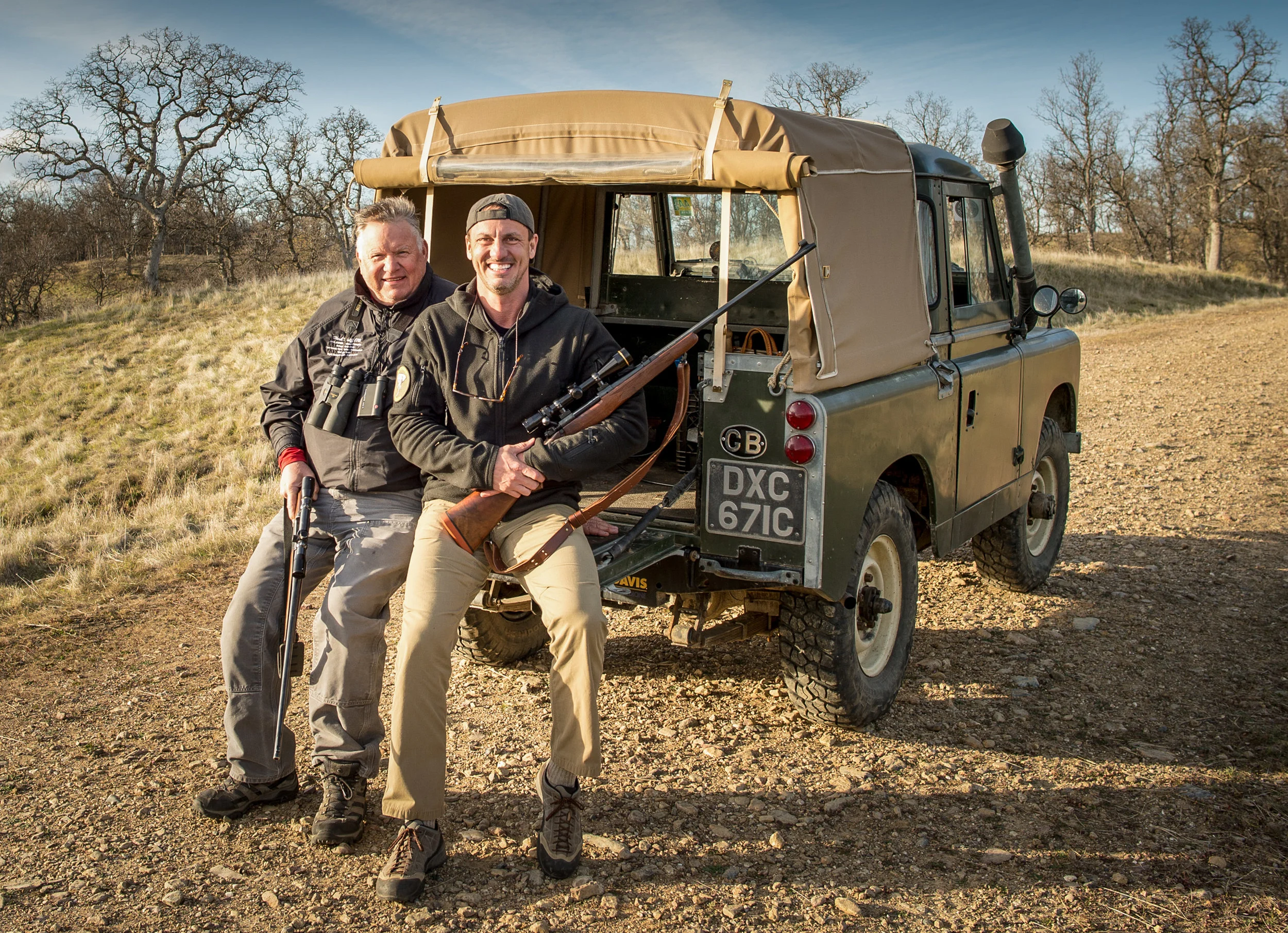 Jim Koenigsaecker and Herb Wolff on the tailgate of Jim’s 1965 Land Rover Series IIA in Red Bluff, California