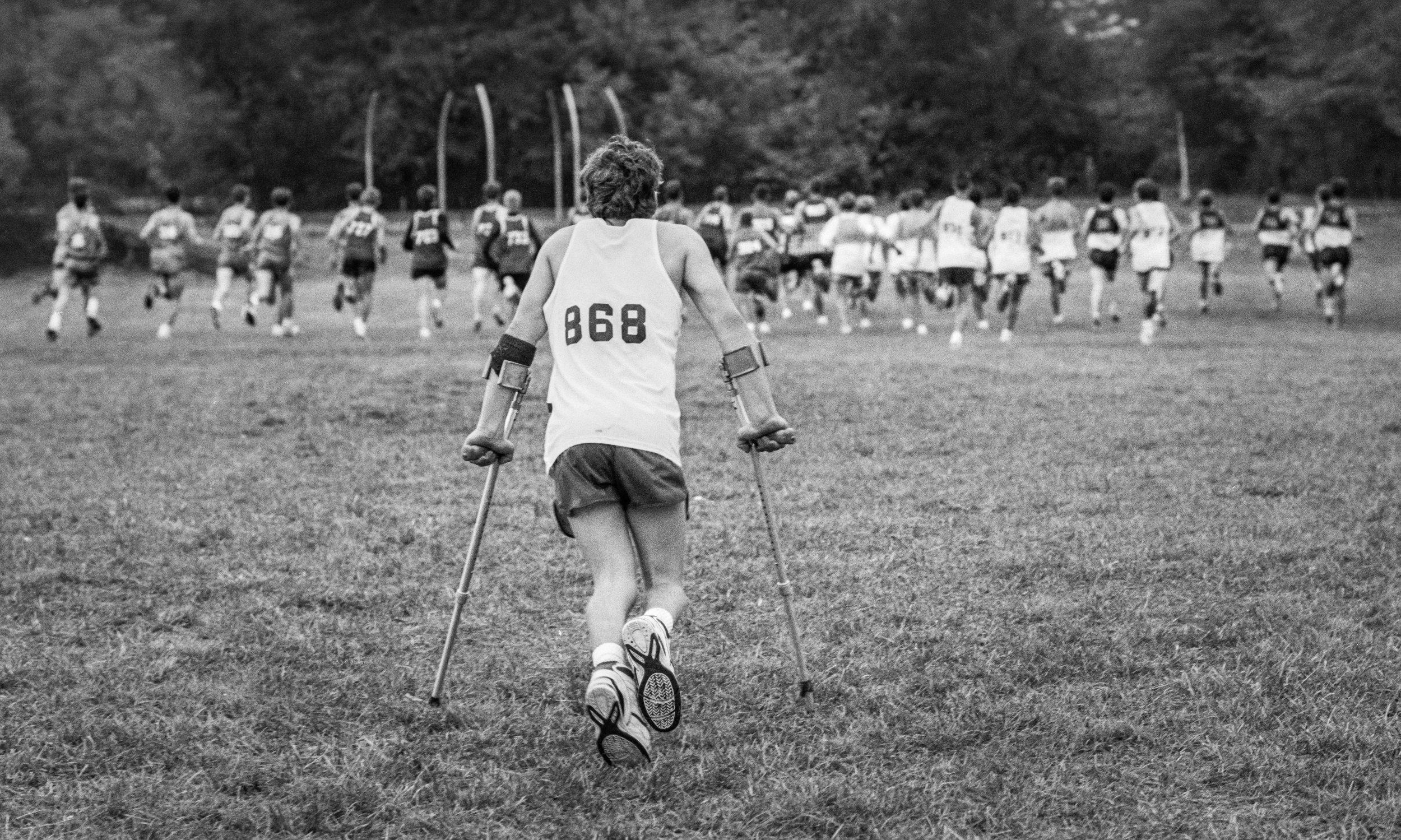 New Albany High School cross-country runner Cory Schnider is quickly left behind at the start of a race in New Albany, Ohio