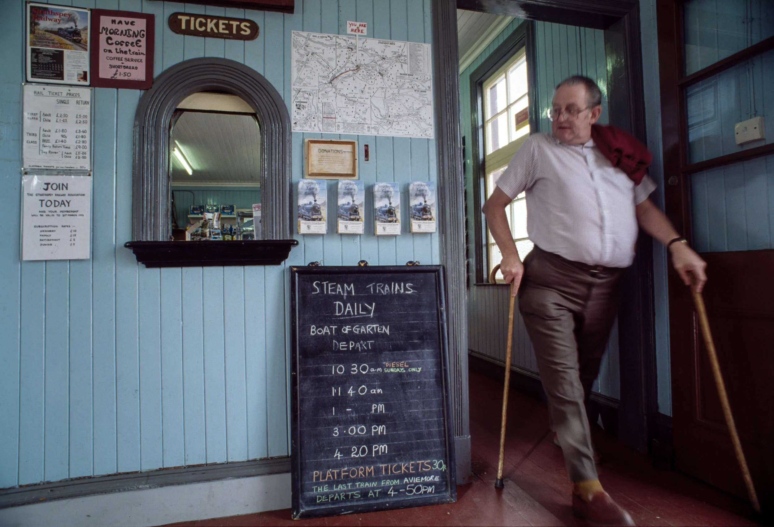 A ticket salesman in the Strathspey Railway station in Aviemore, Scotland