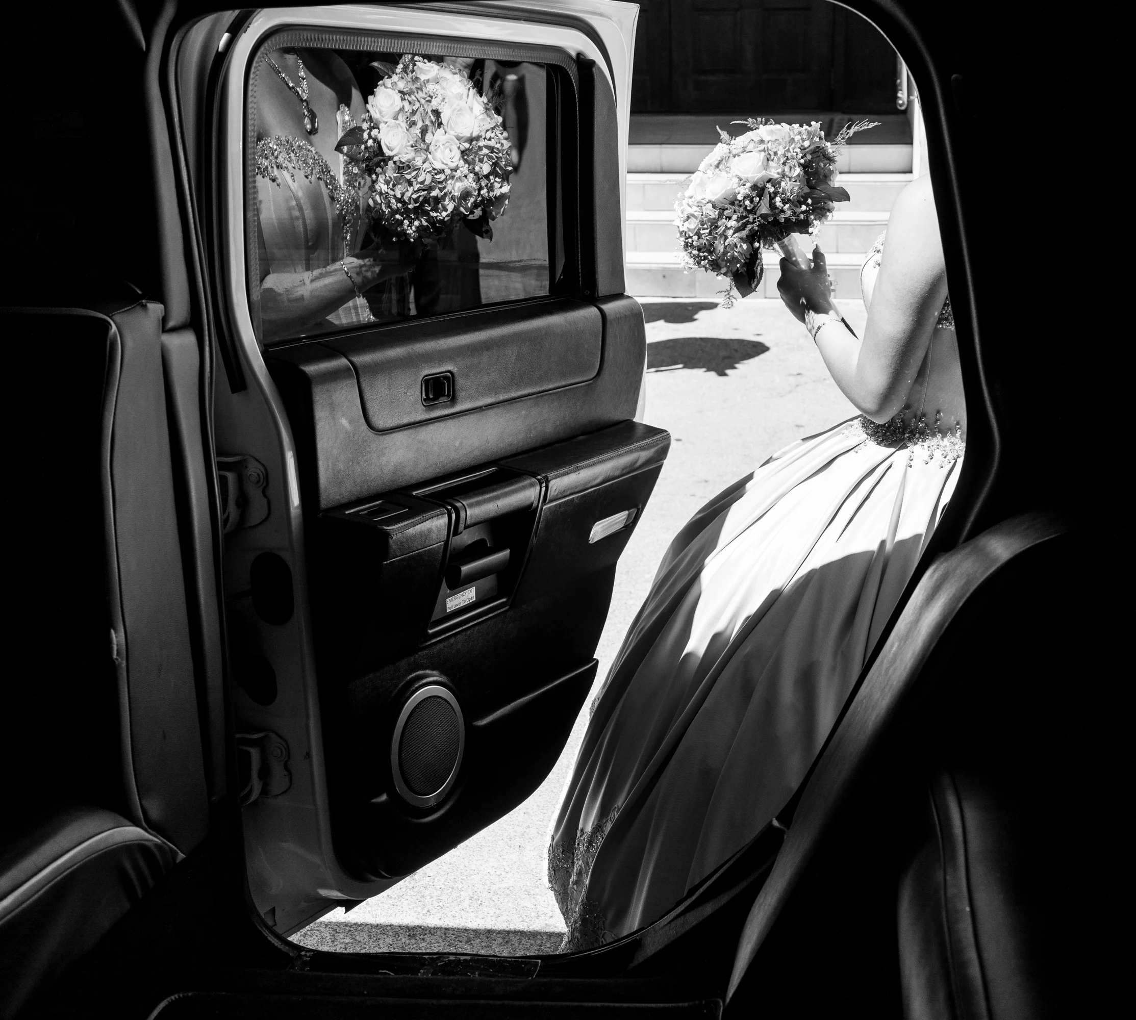 Adriana Gonzalez getting into a limousine after her quinceañera at Our Lady of Guadalupe Church in Sacramento, California