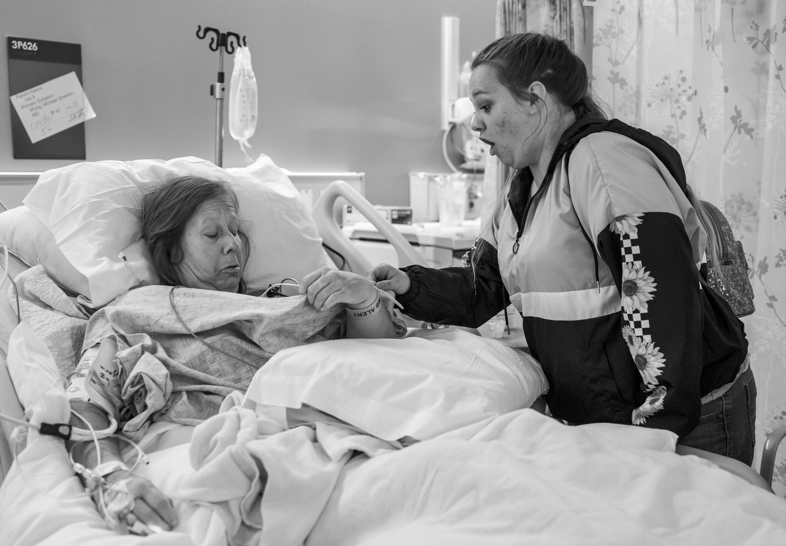 Sandy Holden and her daughter Tymika Lopez react after seeing the results of Sandy’s breast reconstruction surgery at UC Davis Medical Center in Sacramento, California