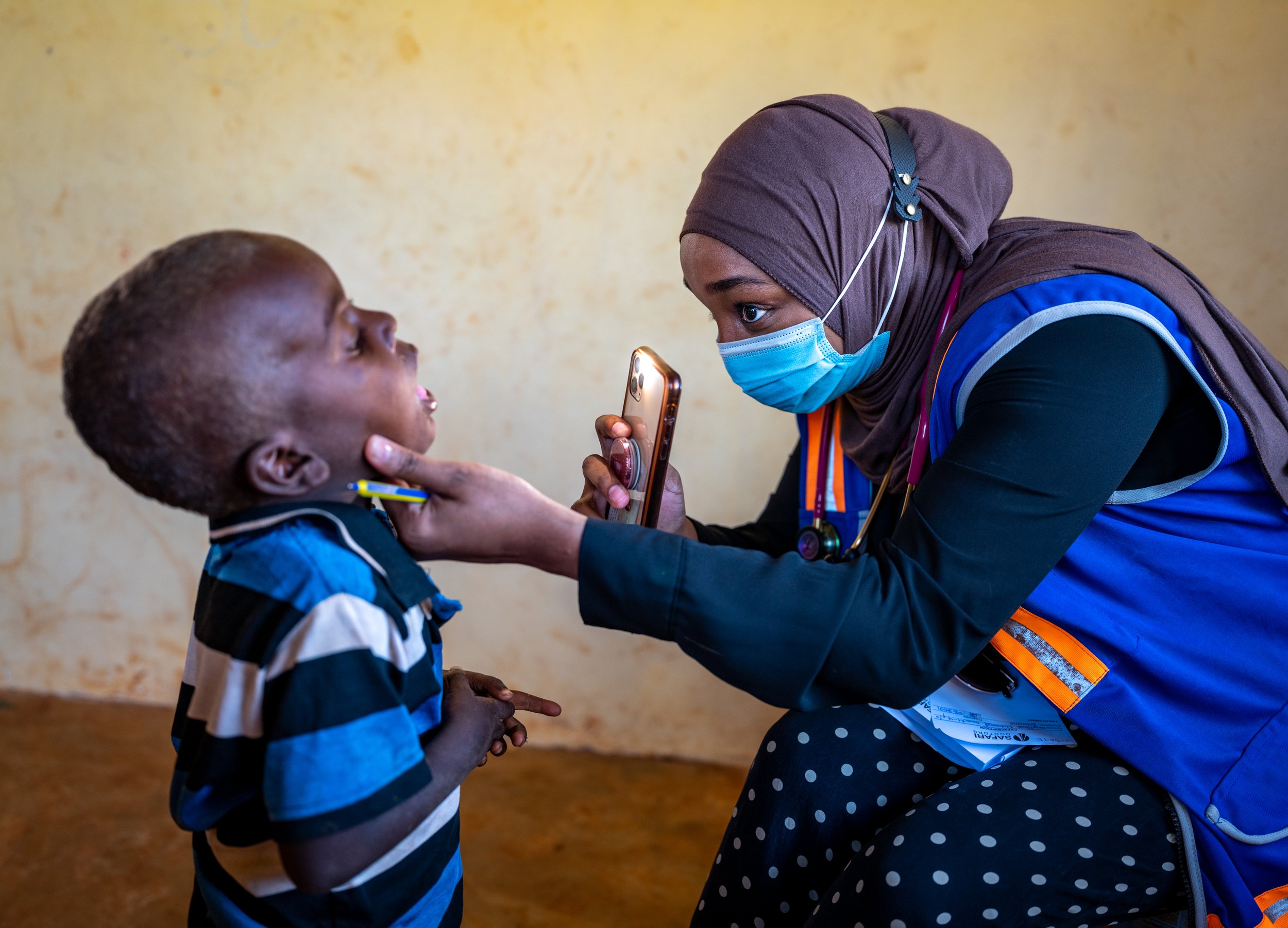 Doctor Mila Ibrahim examines a patient on Pate Island in Kenya