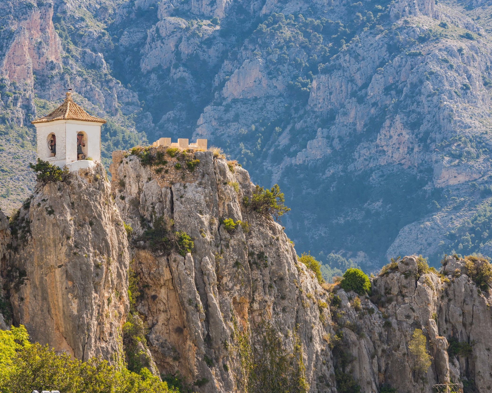 3.5+bell-tower-of-guadalest-castle-on-top-of-the-rock-PW5TFKC-min.jpg