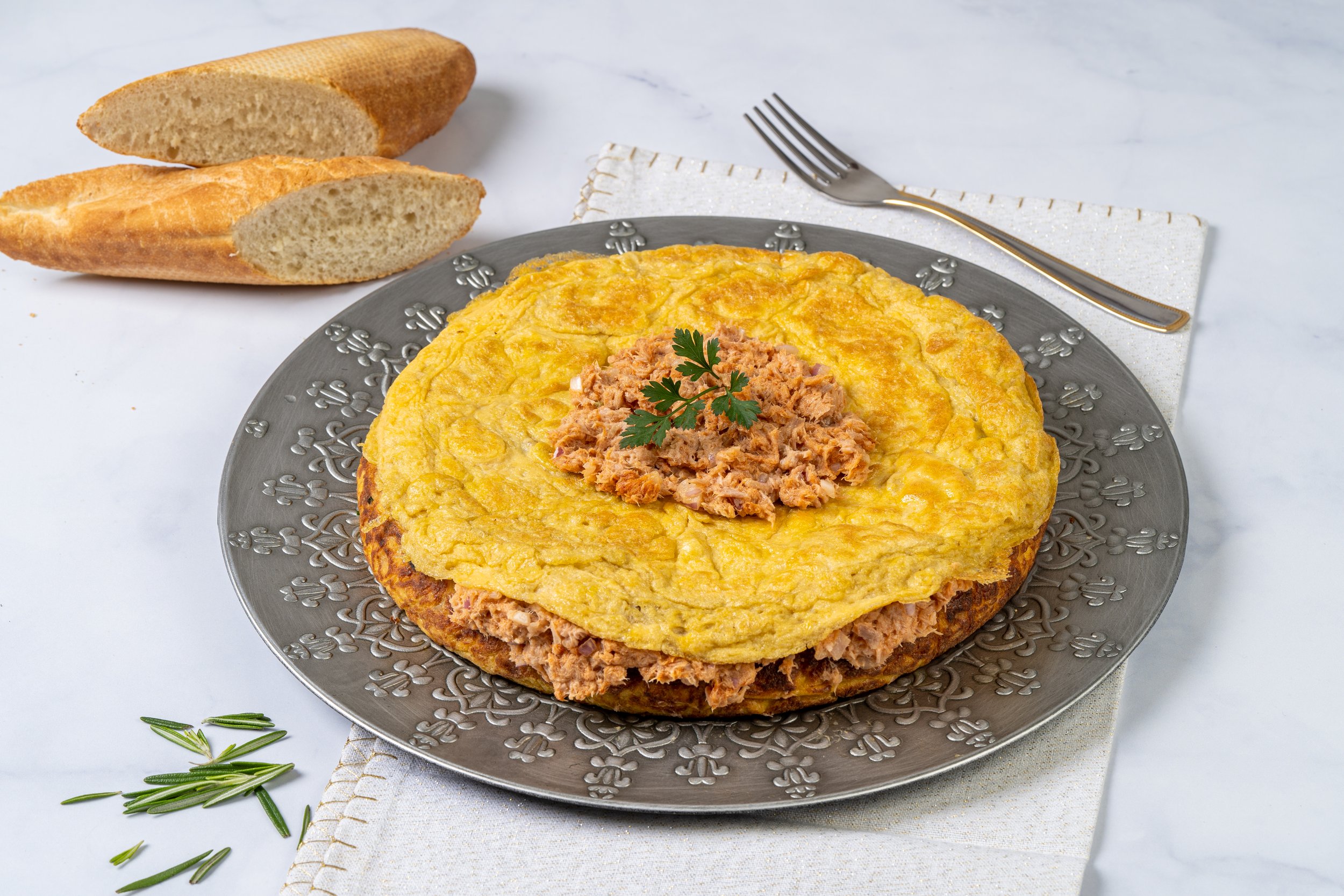 typical-spanish-tortilla-with-tuna-marble-table.jpg