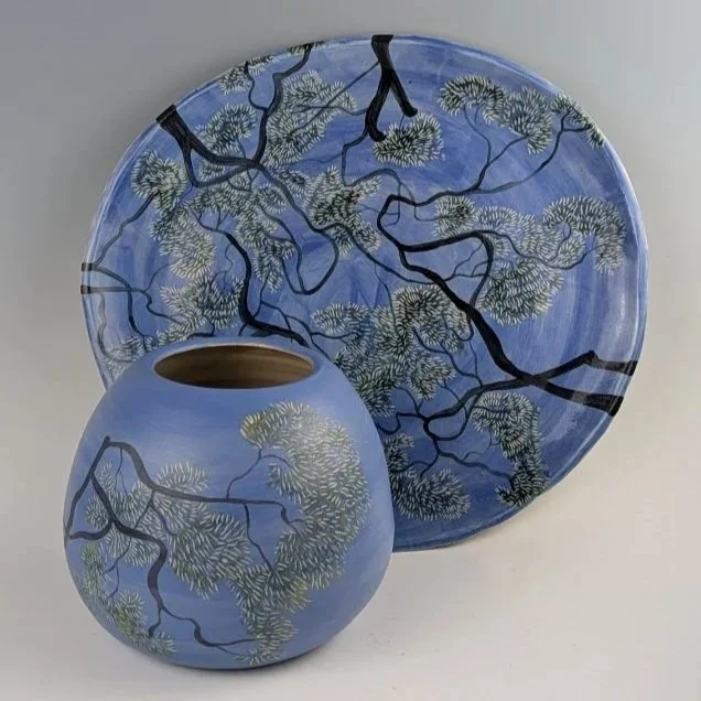 'Where the Branches Meet' (Platter)

A unique collaboration between Nicci Parry Jones and Bronwyn Davies.

The expansive circular form allows the canopy to open outward, creating a striking visual field. Designed as a functional platter or display pi