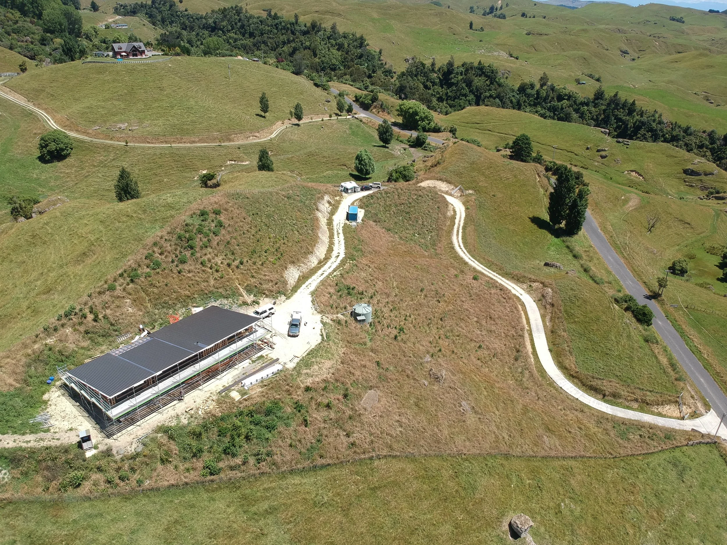 Drone view of roof and land