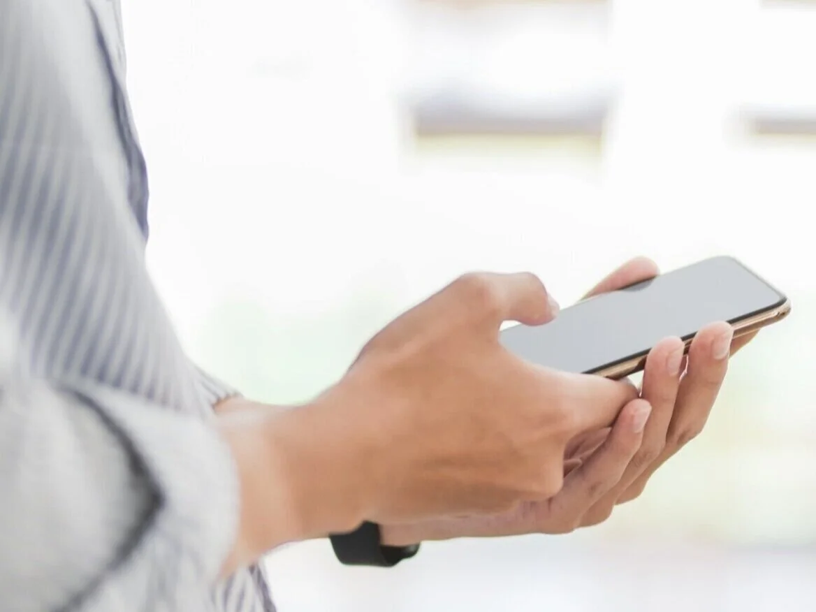 person-holding-white-smartphone-3803423.jpg