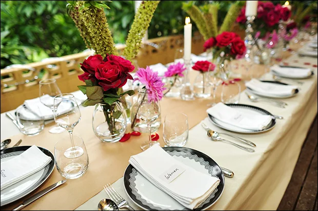 Make guests feel special by creating a gorgeous dining space. Mexico is full of beautiful colours, so I decided to choose two strong shades - red and fuchsia - and work them back with neutrals and the green of the garden.