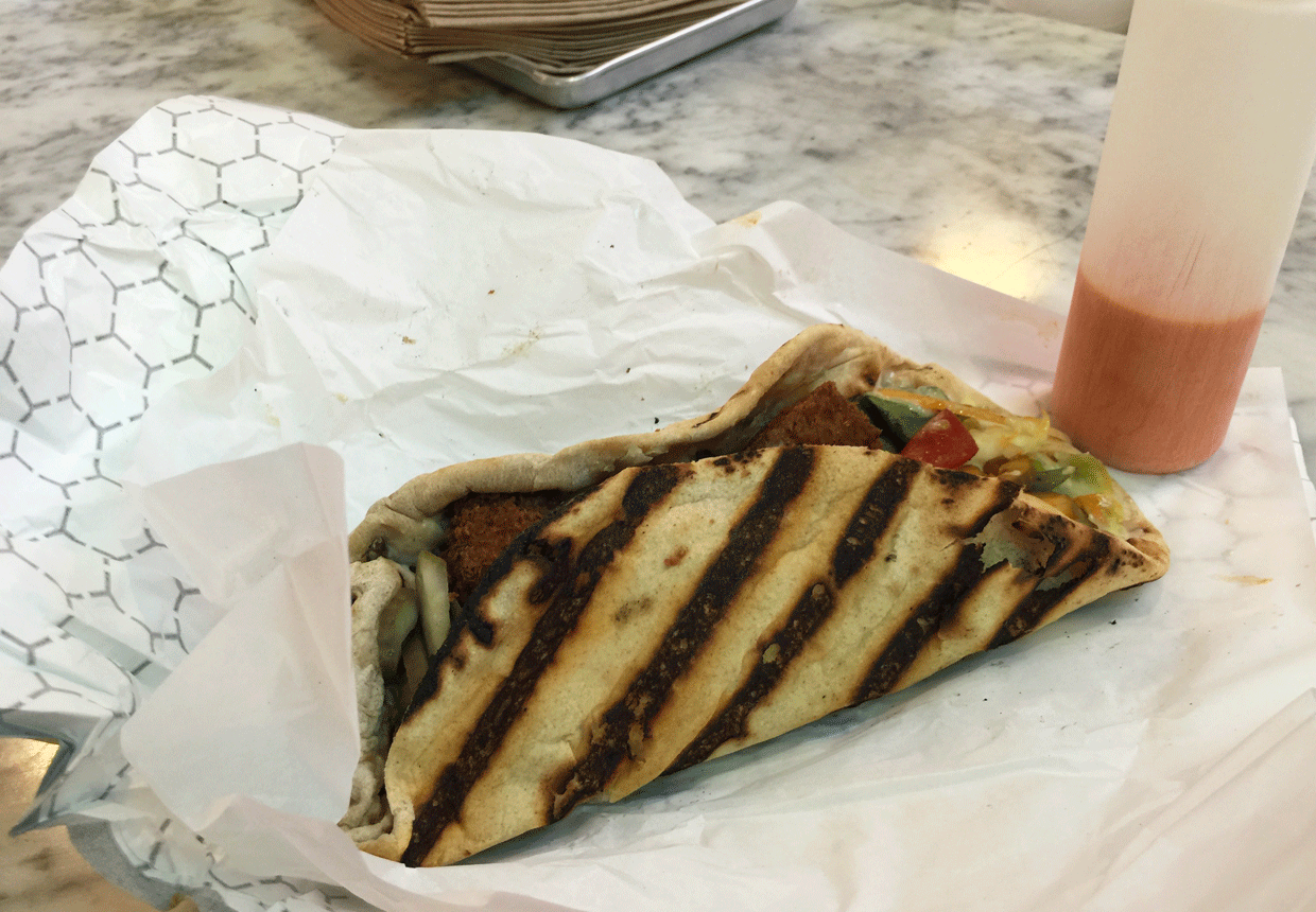 Madcarpa: Only the best fresh falafel sandwich in the history of best falafel sandwiches. It doesn’t look like much (above) but I dream about this food moment. Like all the time. Even writing about this sandwich is giving me anxiety.
