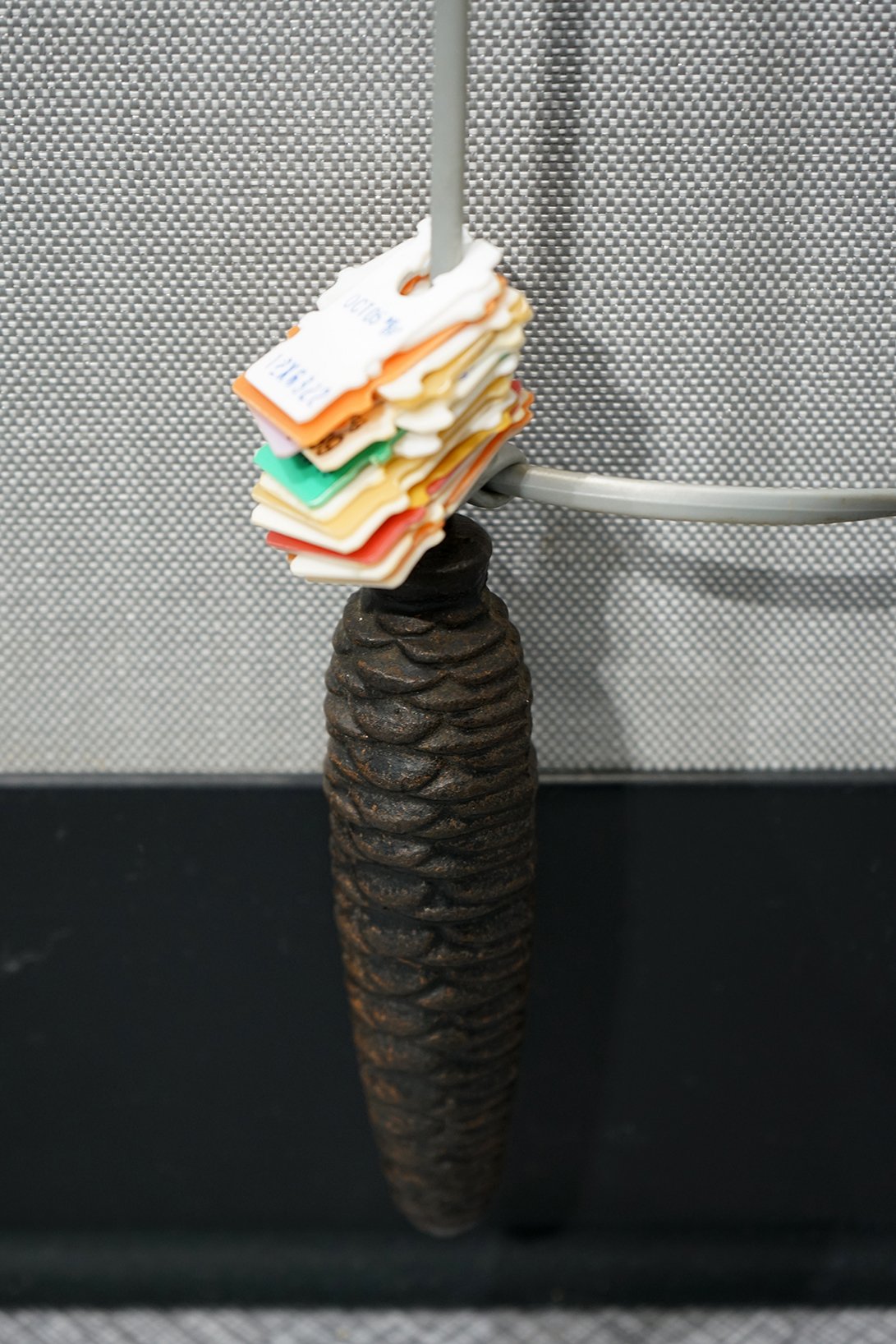 phone cord, clock weight, bread clips