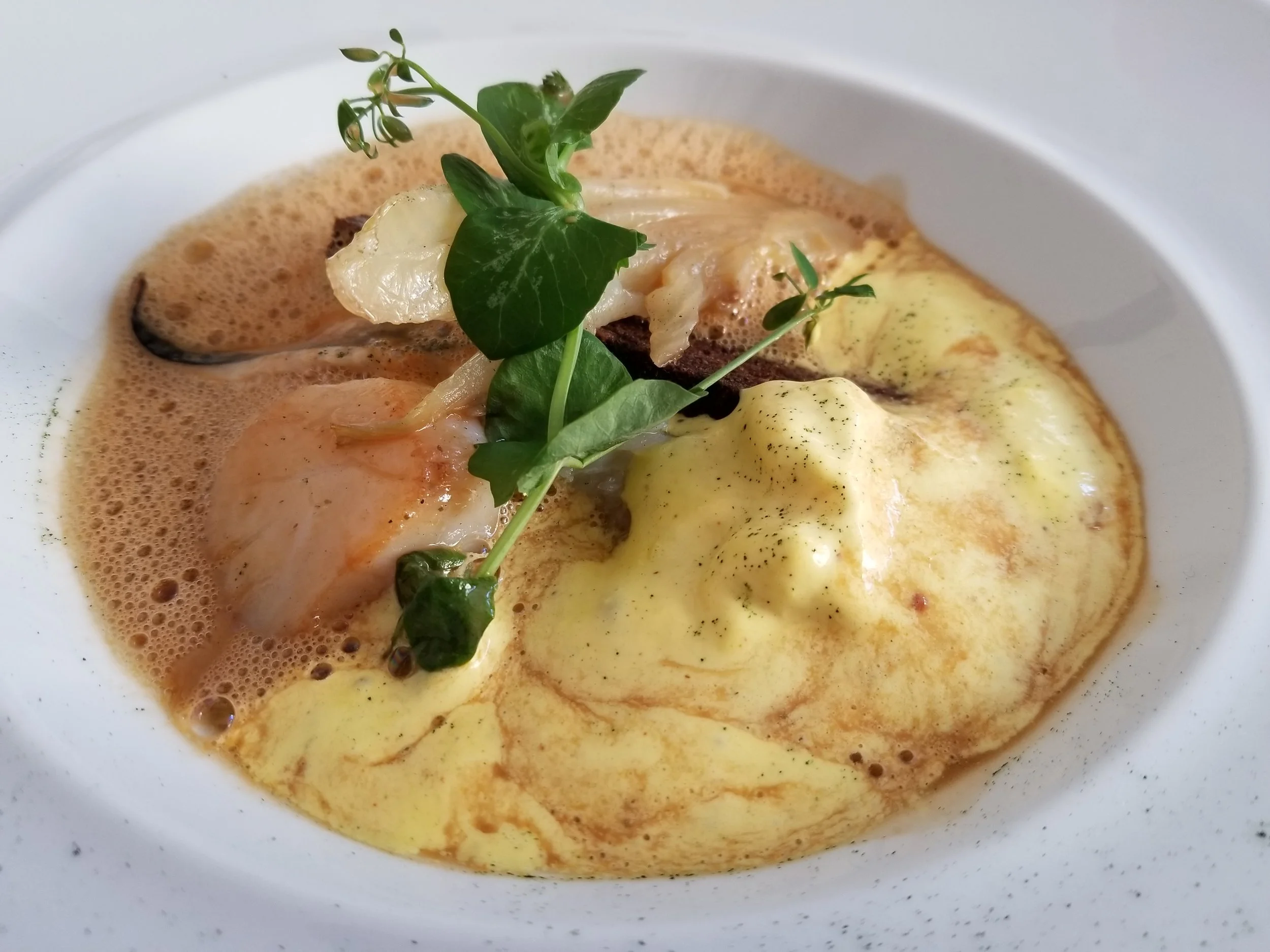 Bouillabaisse with fennel confit, scallops, St. Pierre and aioli.