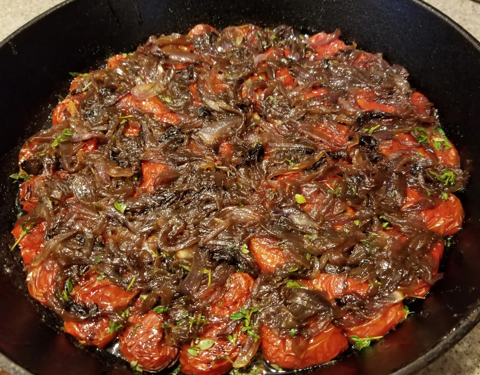 Caramelized red onions over oven roasted tomatoes