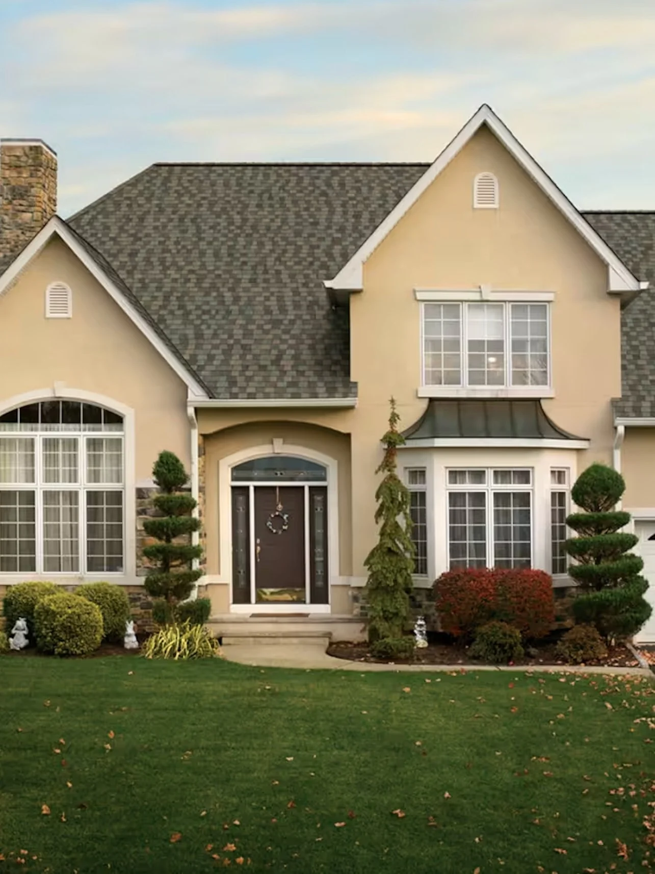 house with a lush front yard