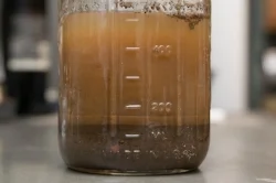 Soil separating into layers.