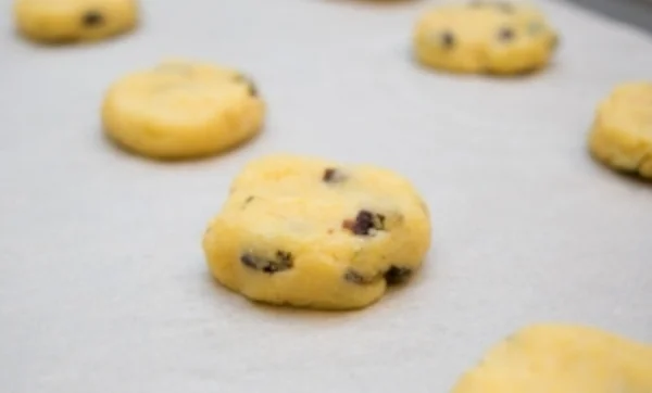 Flattening the thyme cookie dough.
