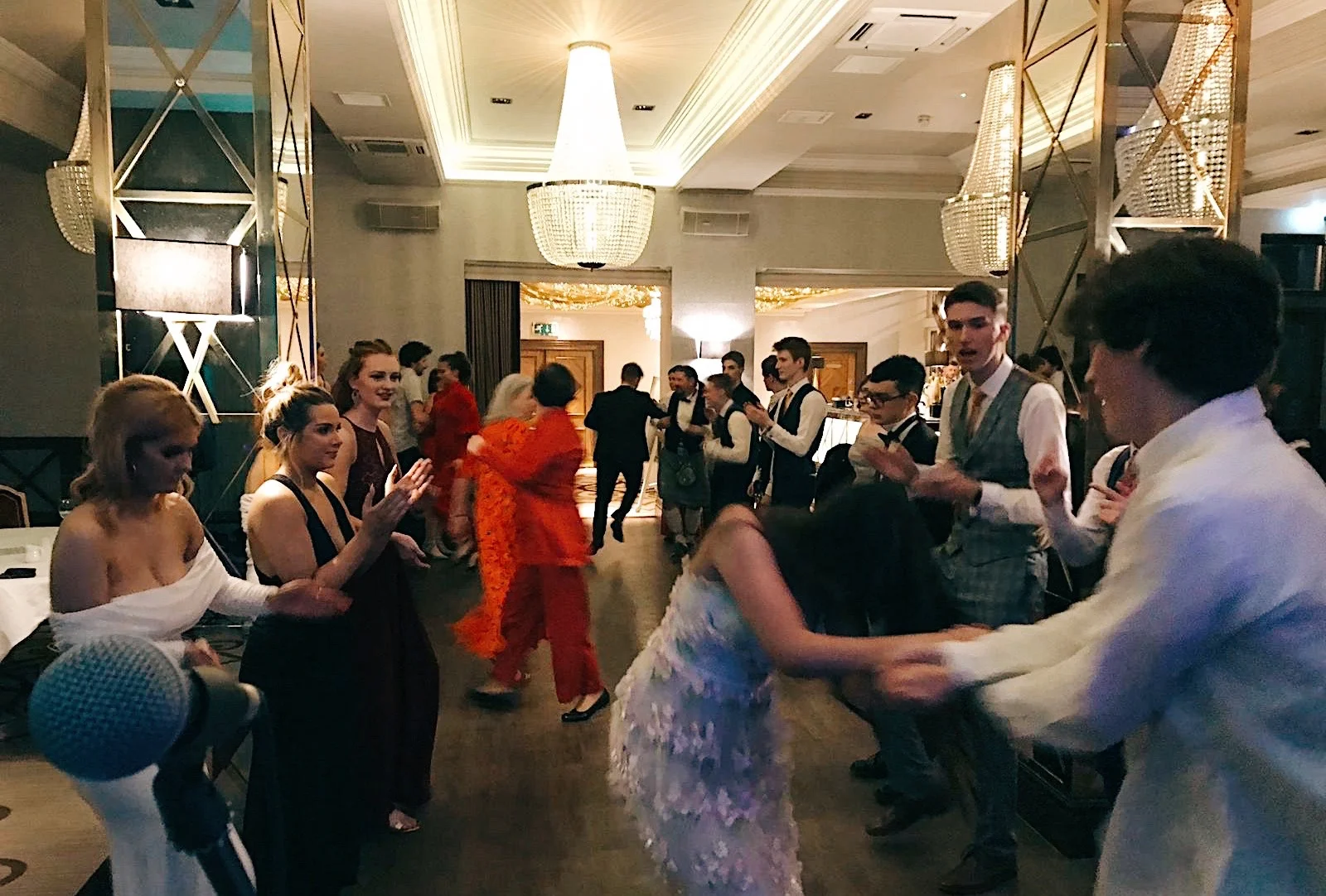 Enthusiastic dancers giving it laldy at their prom