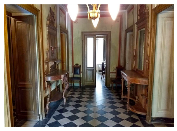 Original furniture houses one of the hallways