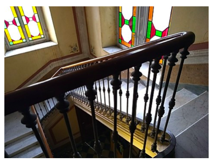 Stain-glass windows and original wood detail