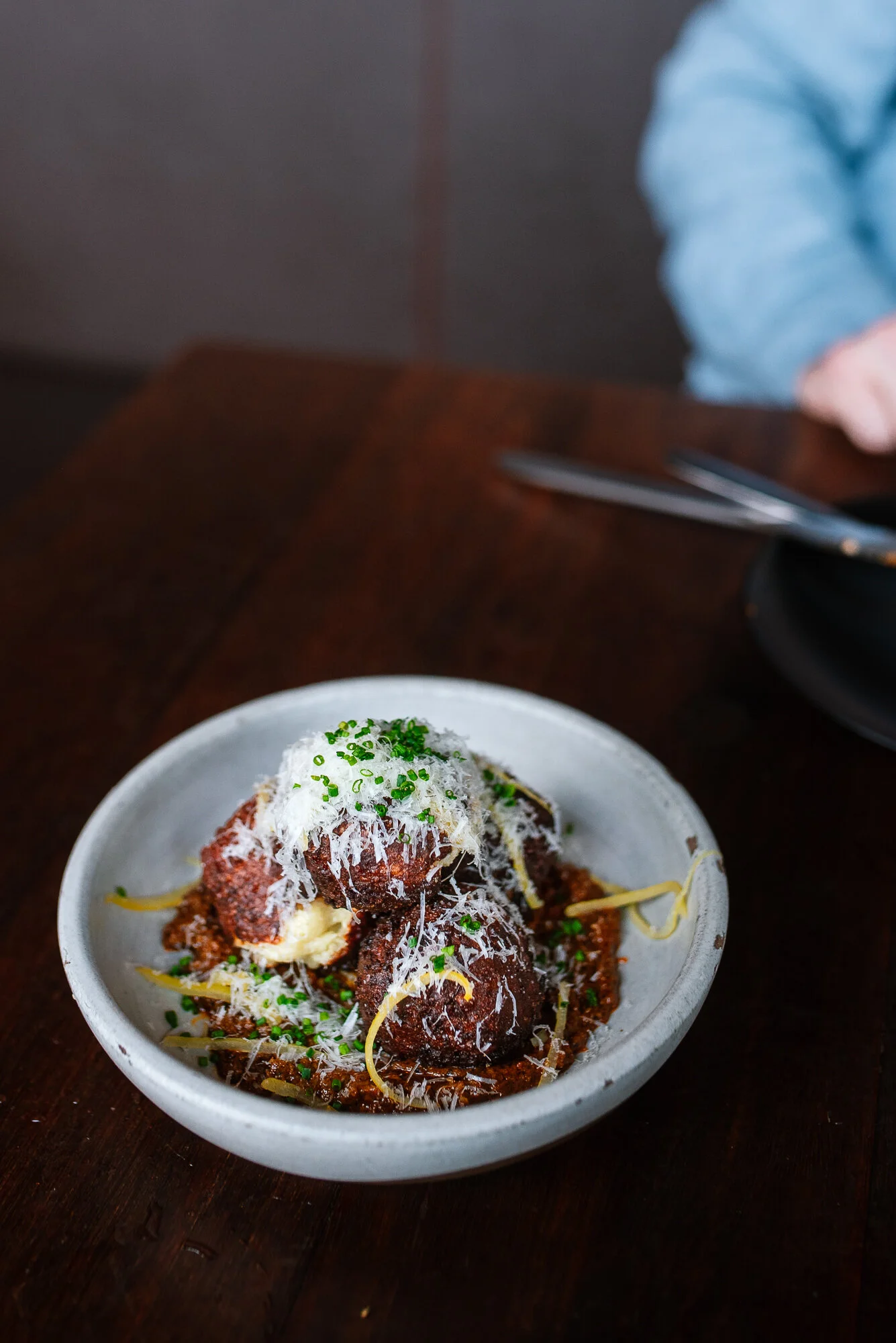 Spanish Cheese Fritters: manchego, mahon, romesco, preserved lemon