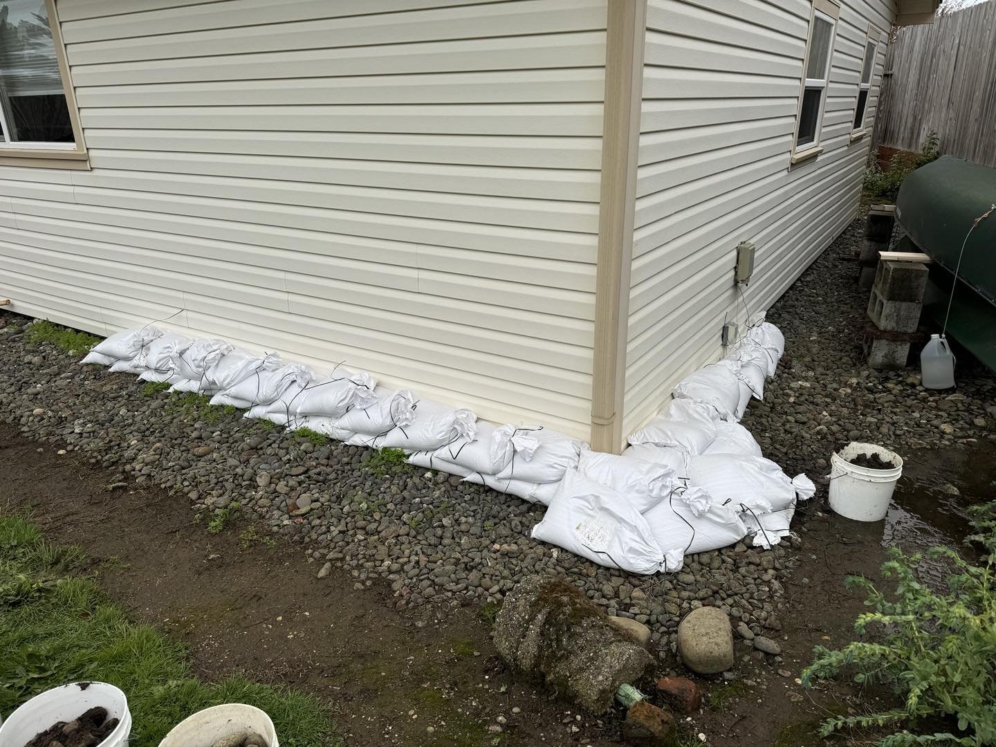 Preparing for the bomb cyclone.  Filled 50 sandbags this morning.  This corner always is a bit scary with standing water in big storms. Have 50 more just in case. #bombcyclone #weather #flooding #climatechange #hunkerdown