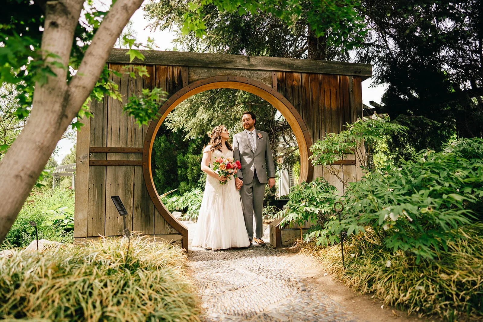 colorado small wedding couple walking down aisle with flowers