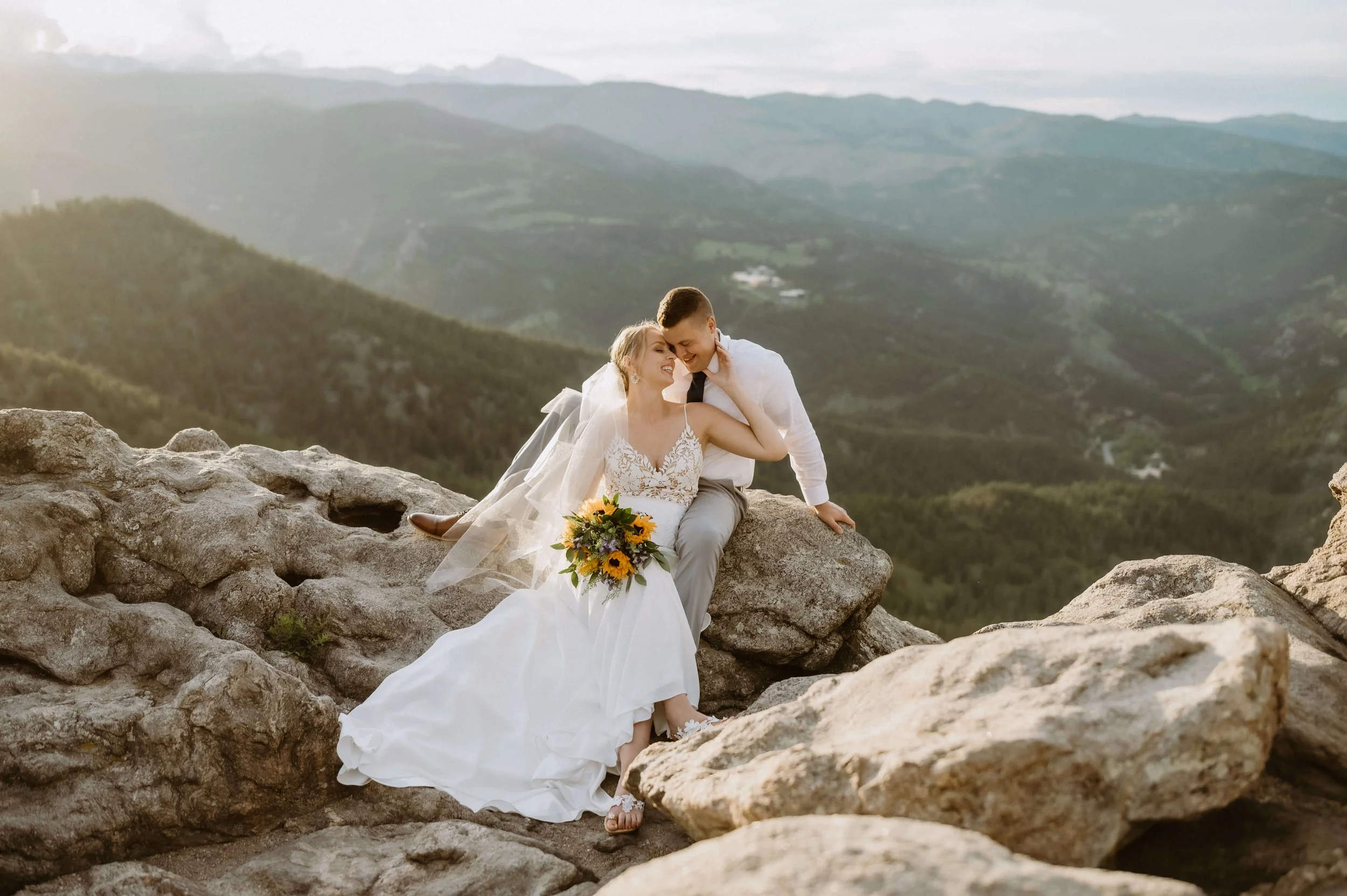wedding couple at the top of lost gulch overlook