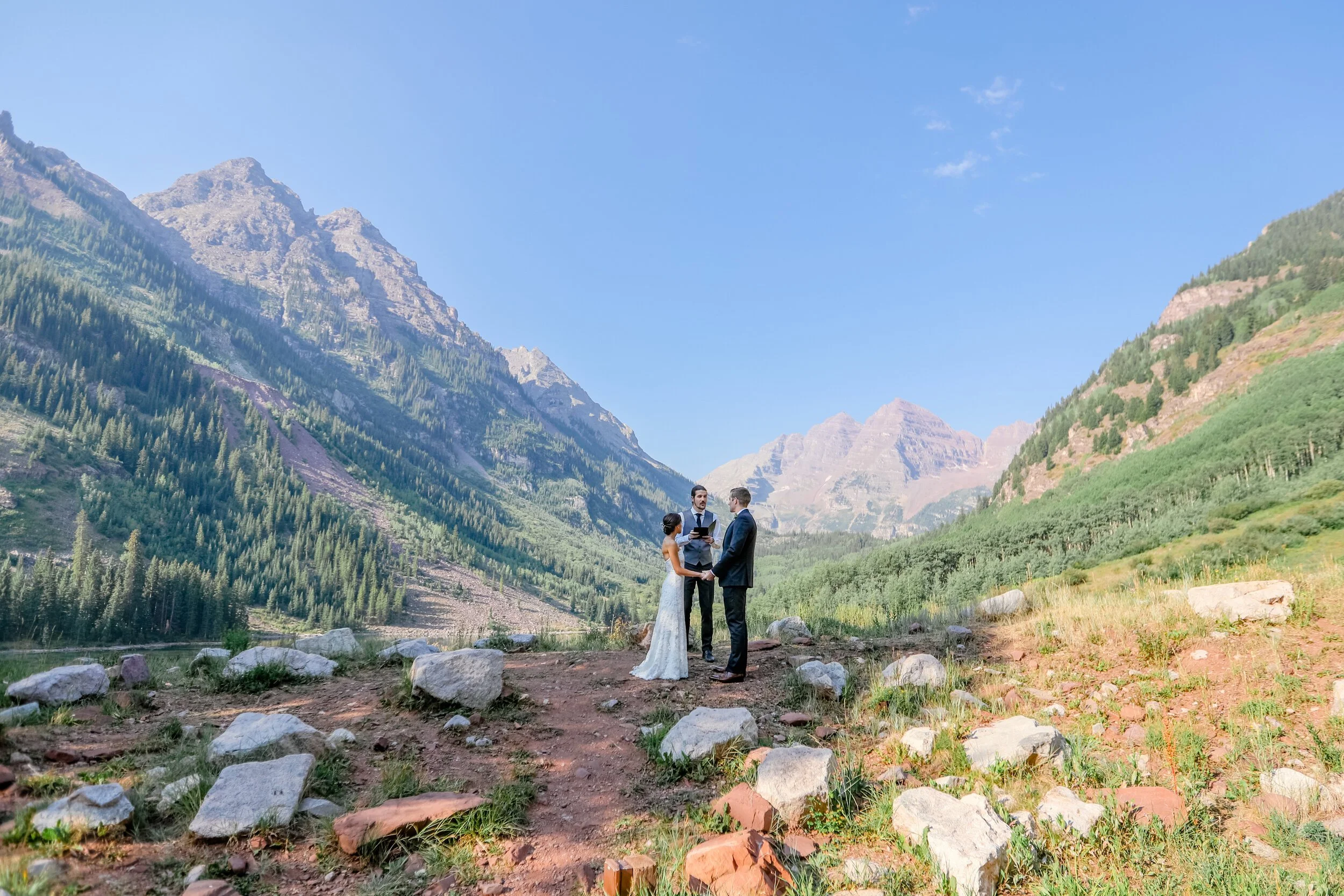 couple eloping at the beautiful maroon bells amphitheater in aspen colorado
