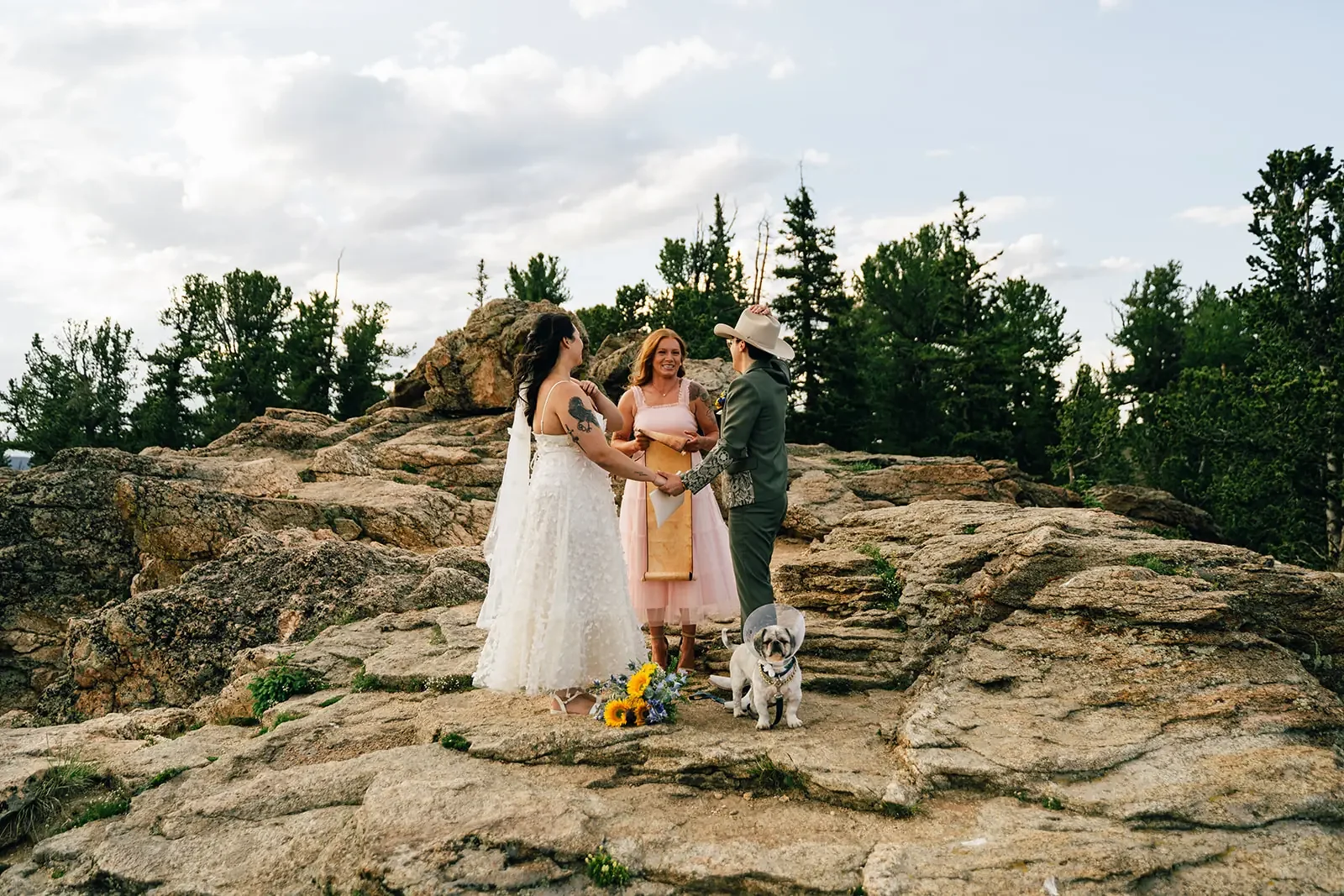 small wedding ceremony at Juniper Pass, near Idaho Springs, with bride and groom and dog