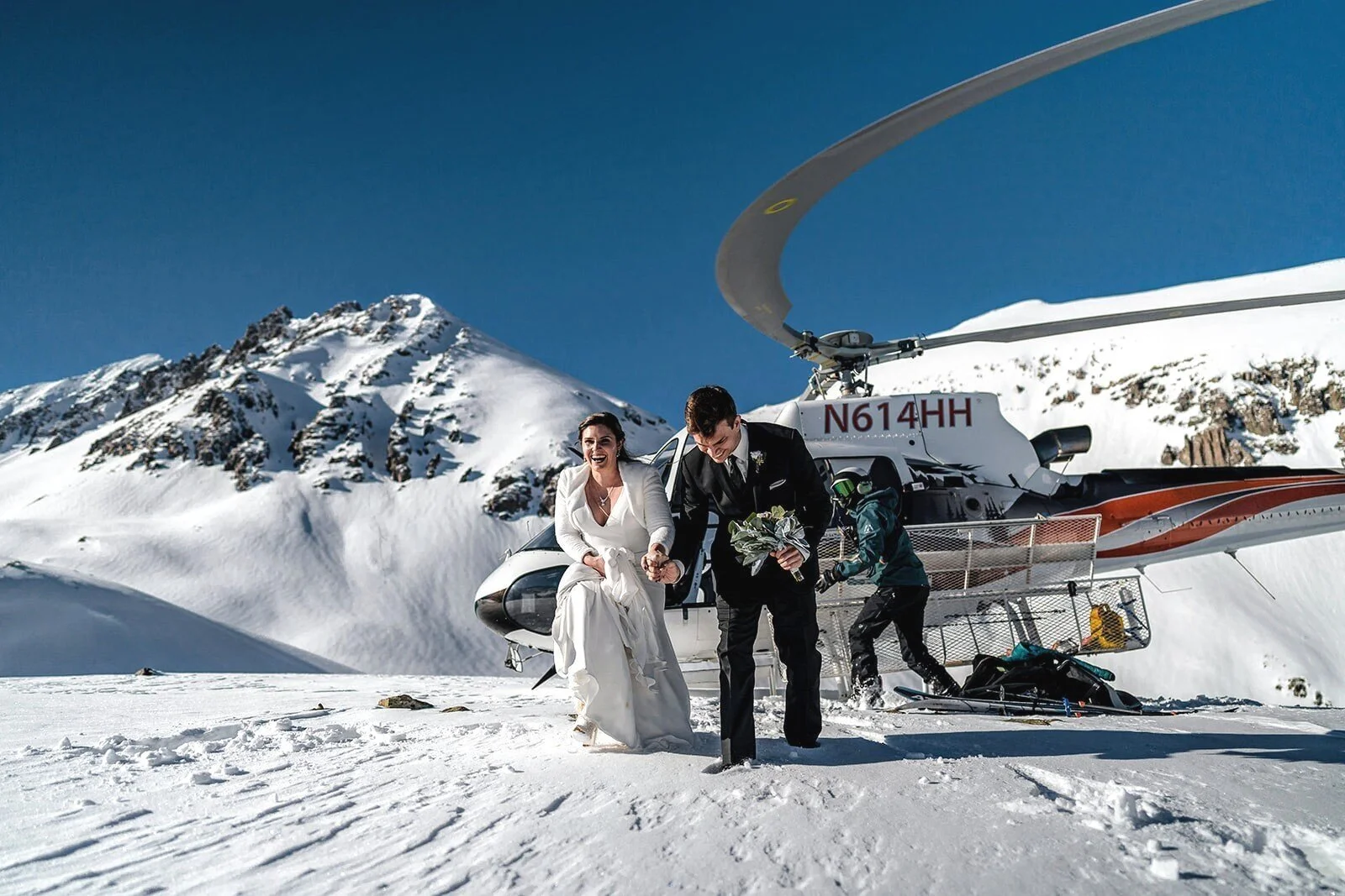 colorado adventure weddings with the couple on top of a mountain at sunrise